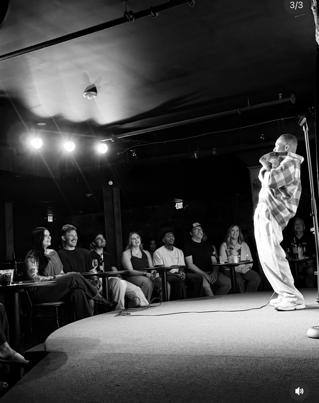 Jeremy Scippio performing stand-up in front of a live audience
