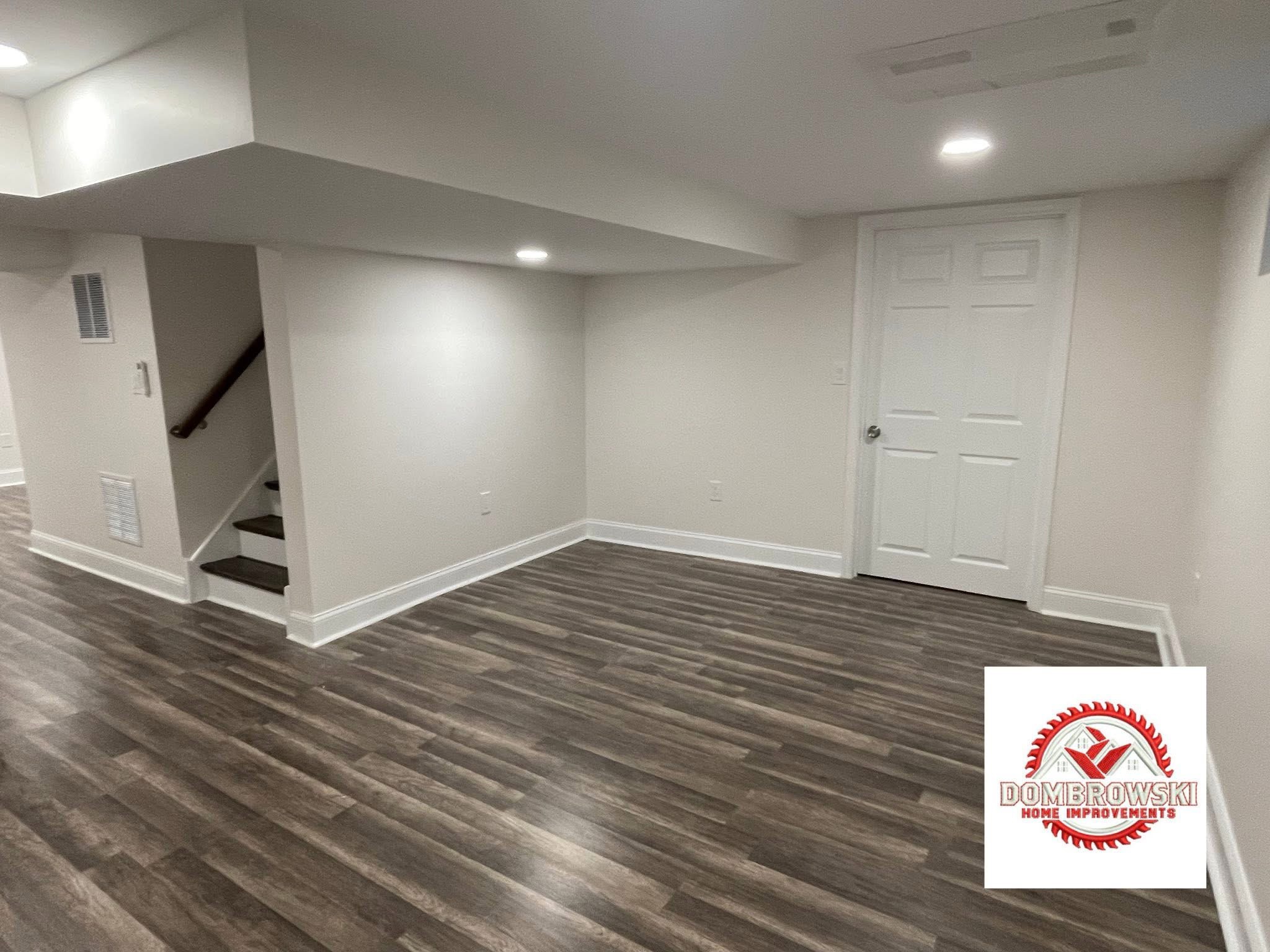 Finished basement multi-room layout with LVP flooring in Bucks County, PA by Dombrowski Home Improvements