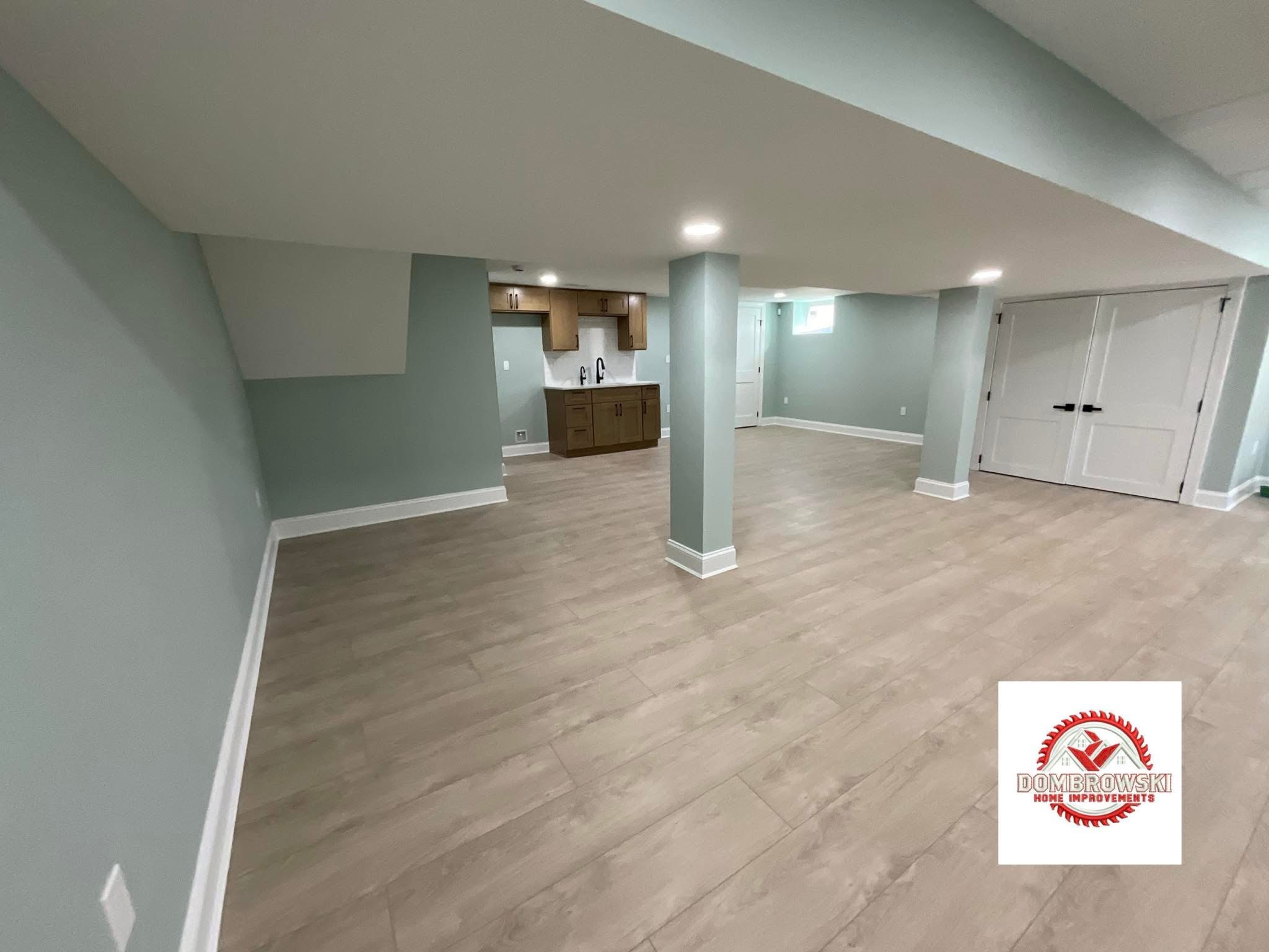 Kitchenette and double door closet: sage green walls