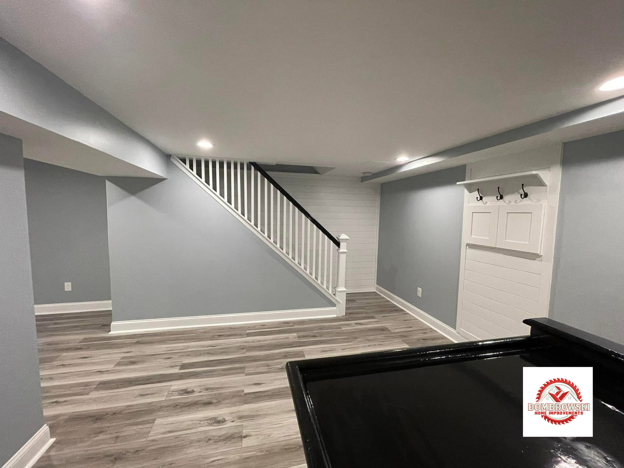 Finished basement stair area with shiplap accent wall, Bucks County PA