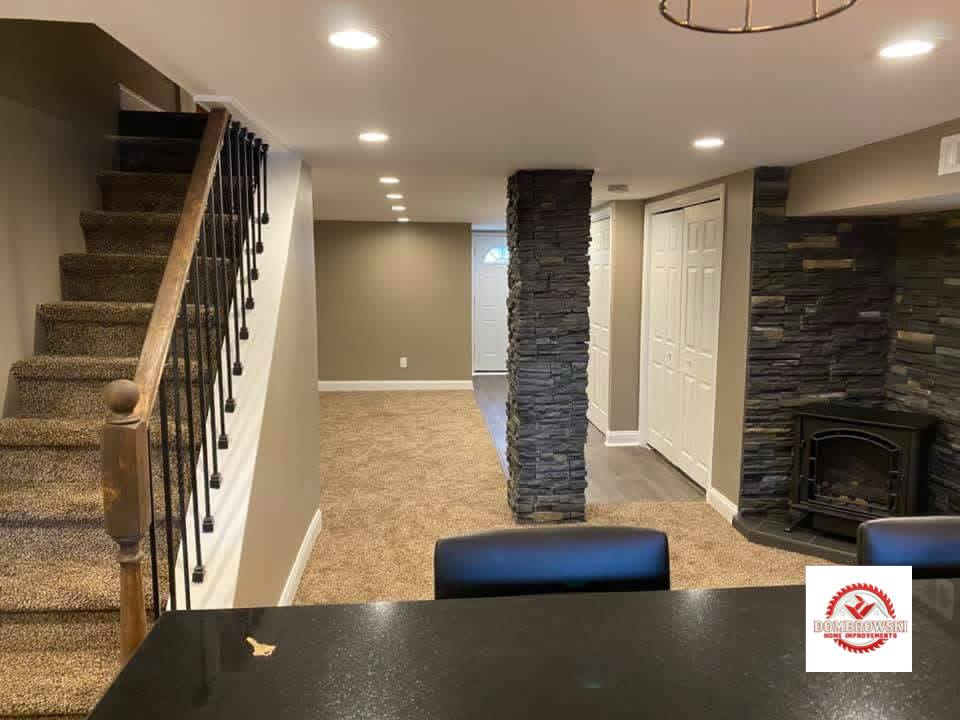 Finished basement remodel with stone column and custom bar, Dombrowski Home Improvements Bucks County PA