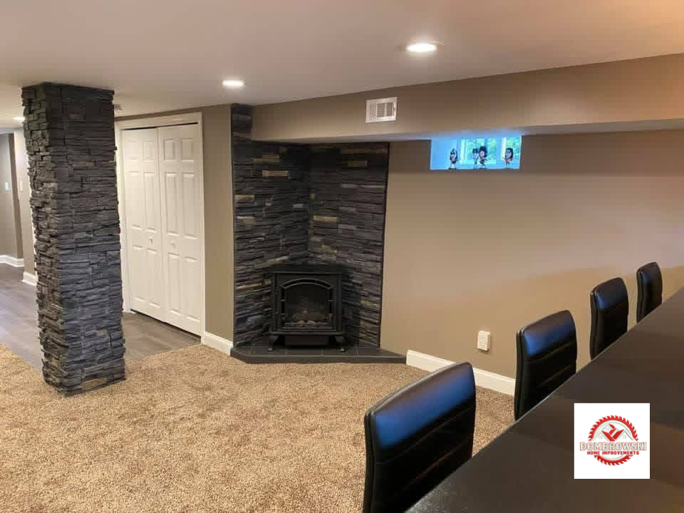 Corner fireplace with stacked stone surround