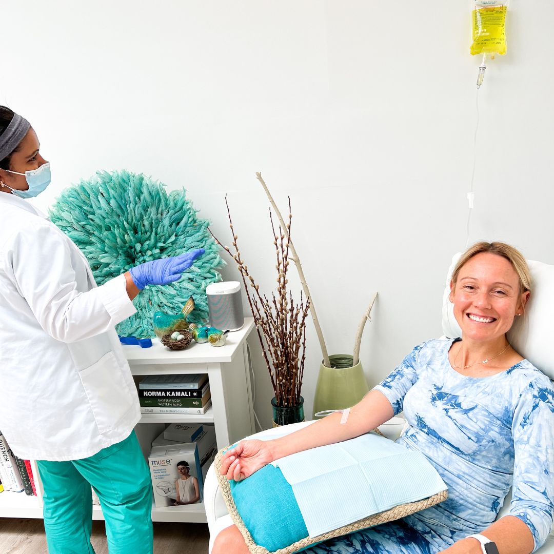 Client receiving IV therapy from a licensed practitioner at Higher Health Centre