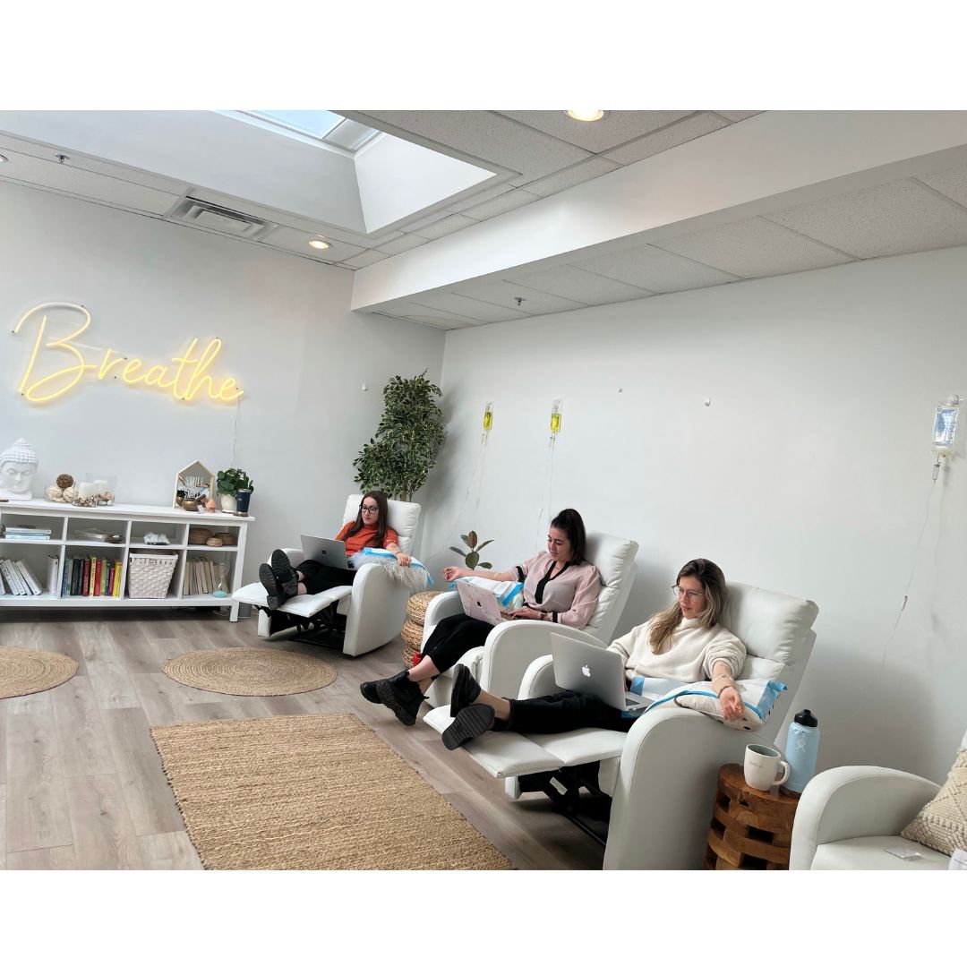 Clients relaxing in the IV lounge at Higher Health Centre