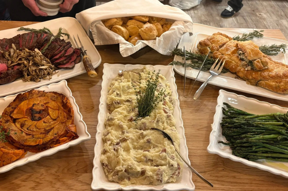 A beautifully arranged buffet table with seasonal ingredients, showcasing full-service event catering in Southern Maine.
