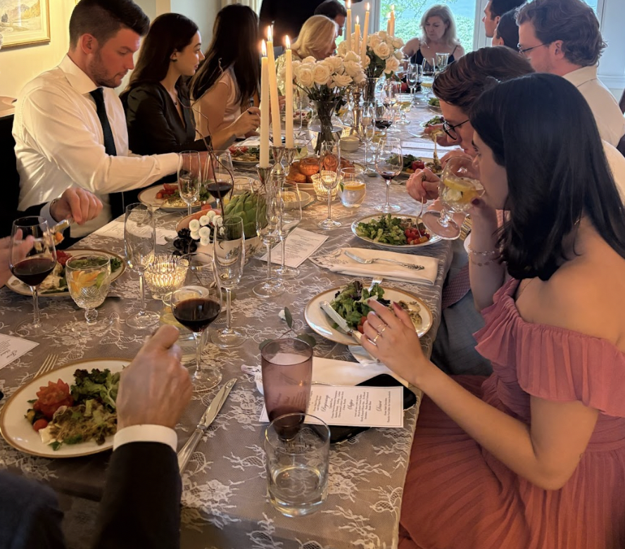 A hot buffet line with elegant silver chafing dishes set up for a private anniversary party or rehearsal dinner at our Southern Maine venue.