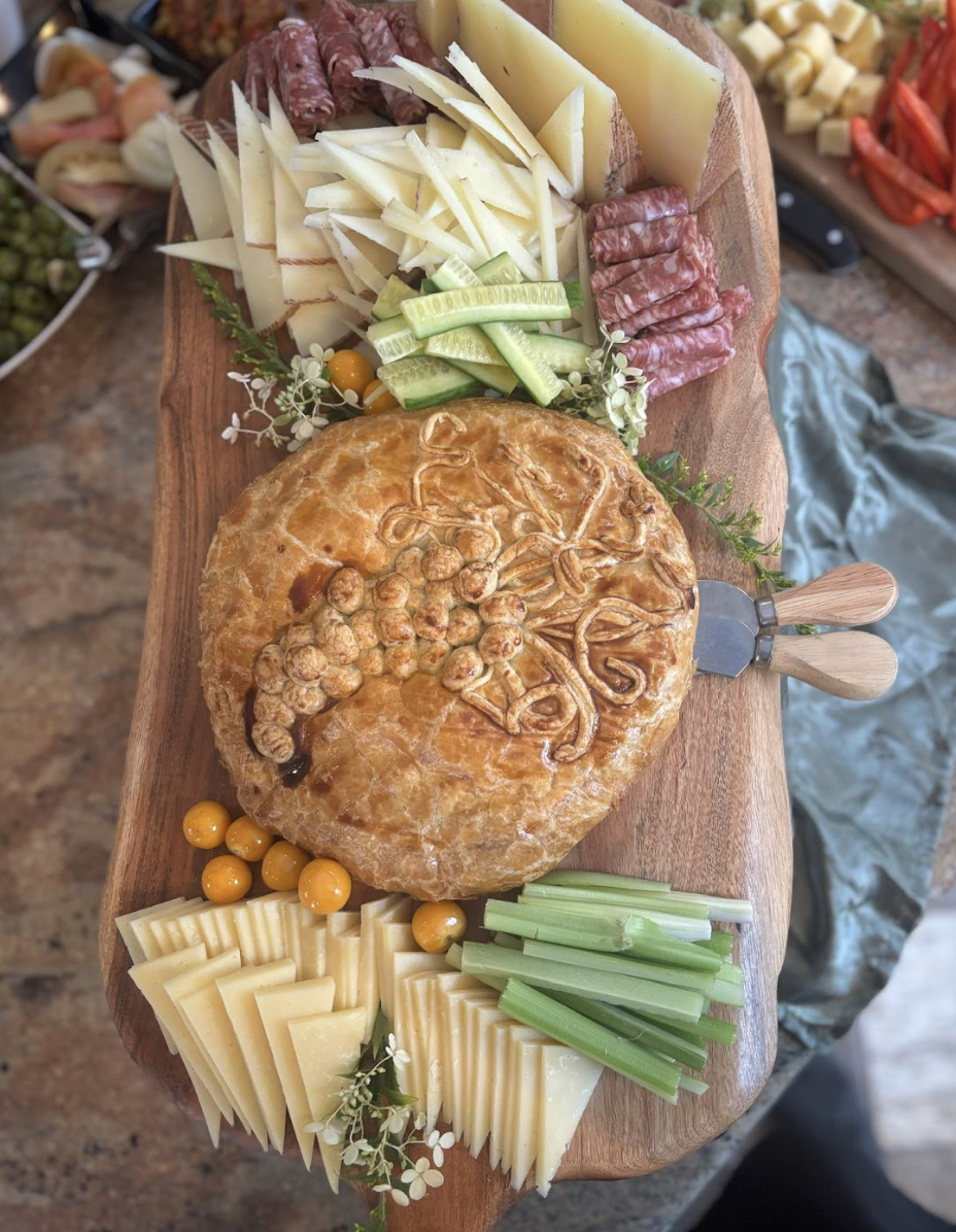 A clean, professional corporate lunch catering spread with upscale platters and fresh ingredients for business conferences in Portland, Maine.