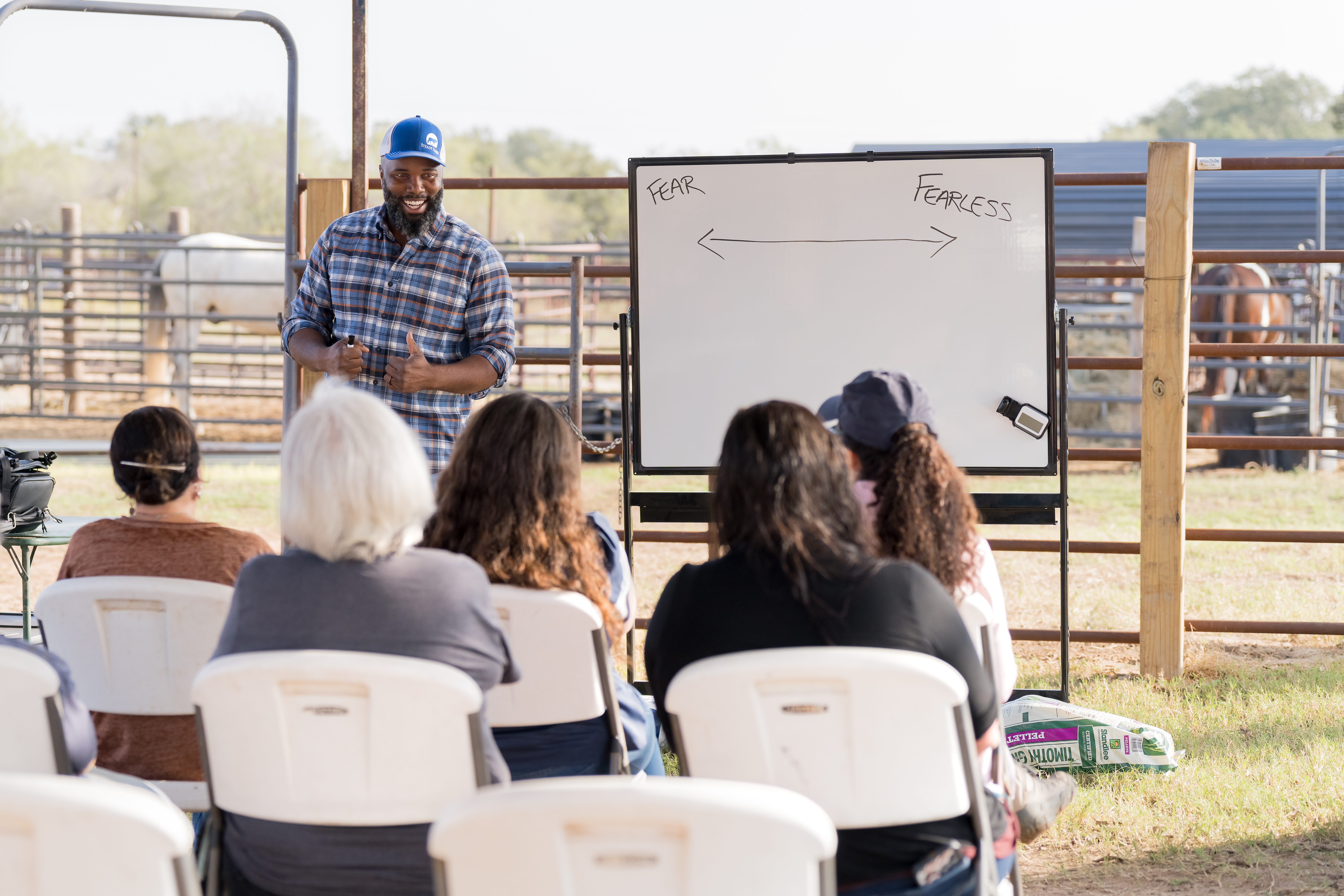 Noah T.Y. working with a horse at Grace Ranch
