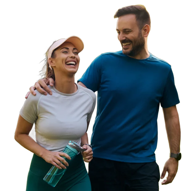 Active couple walking together after non-surgical orthopedic treatment in Waco, Texas