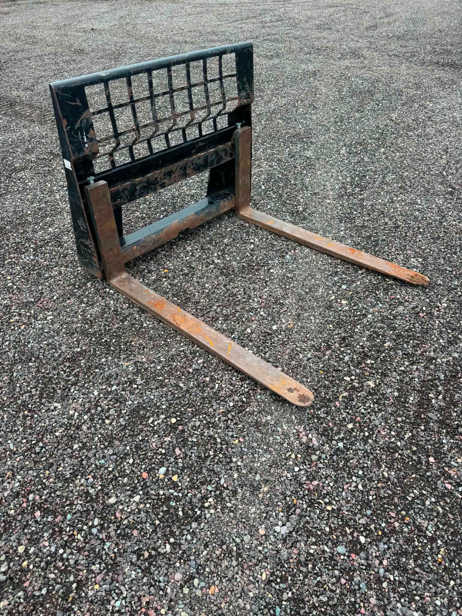 Skid steer fork attachment.