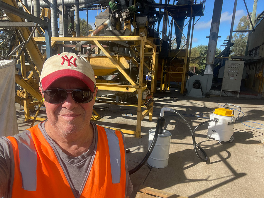 Rob Whittle testing an industrial vacuum system on site