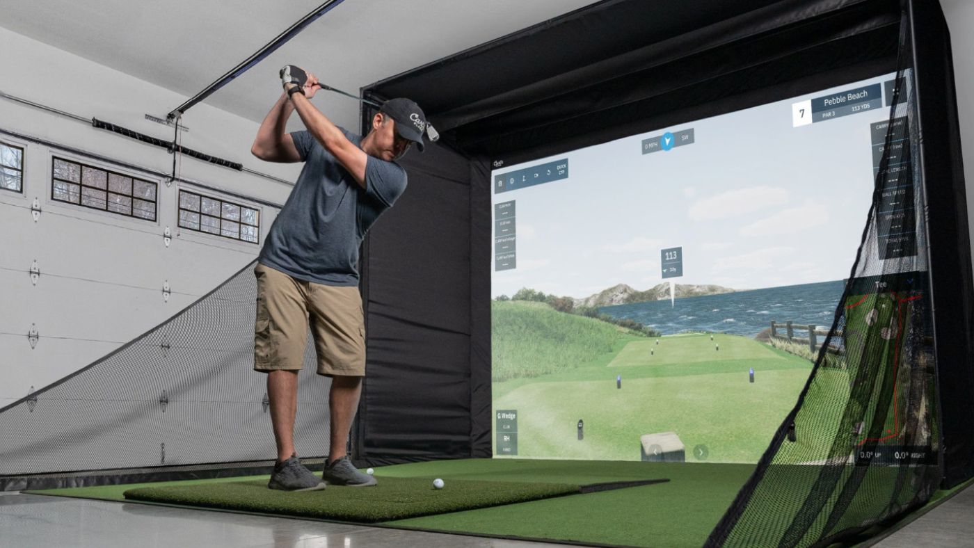 Custom home golf simulator setup in a garage