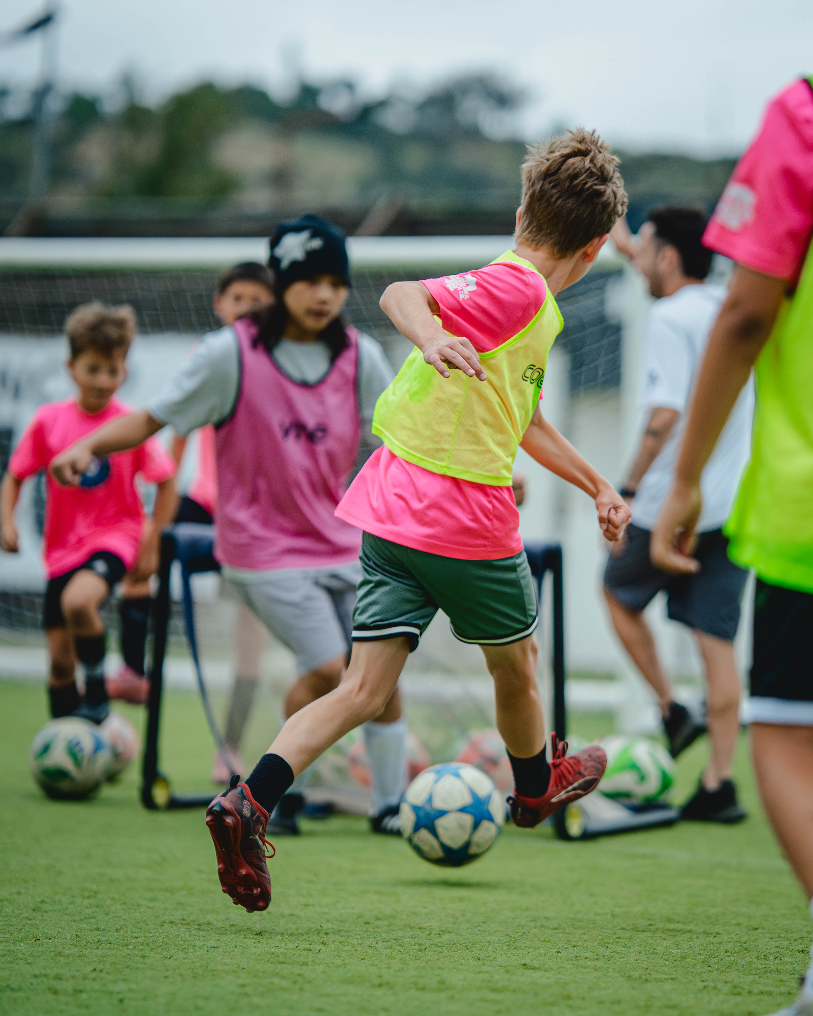 Soro Futbol Academy players training together as a team