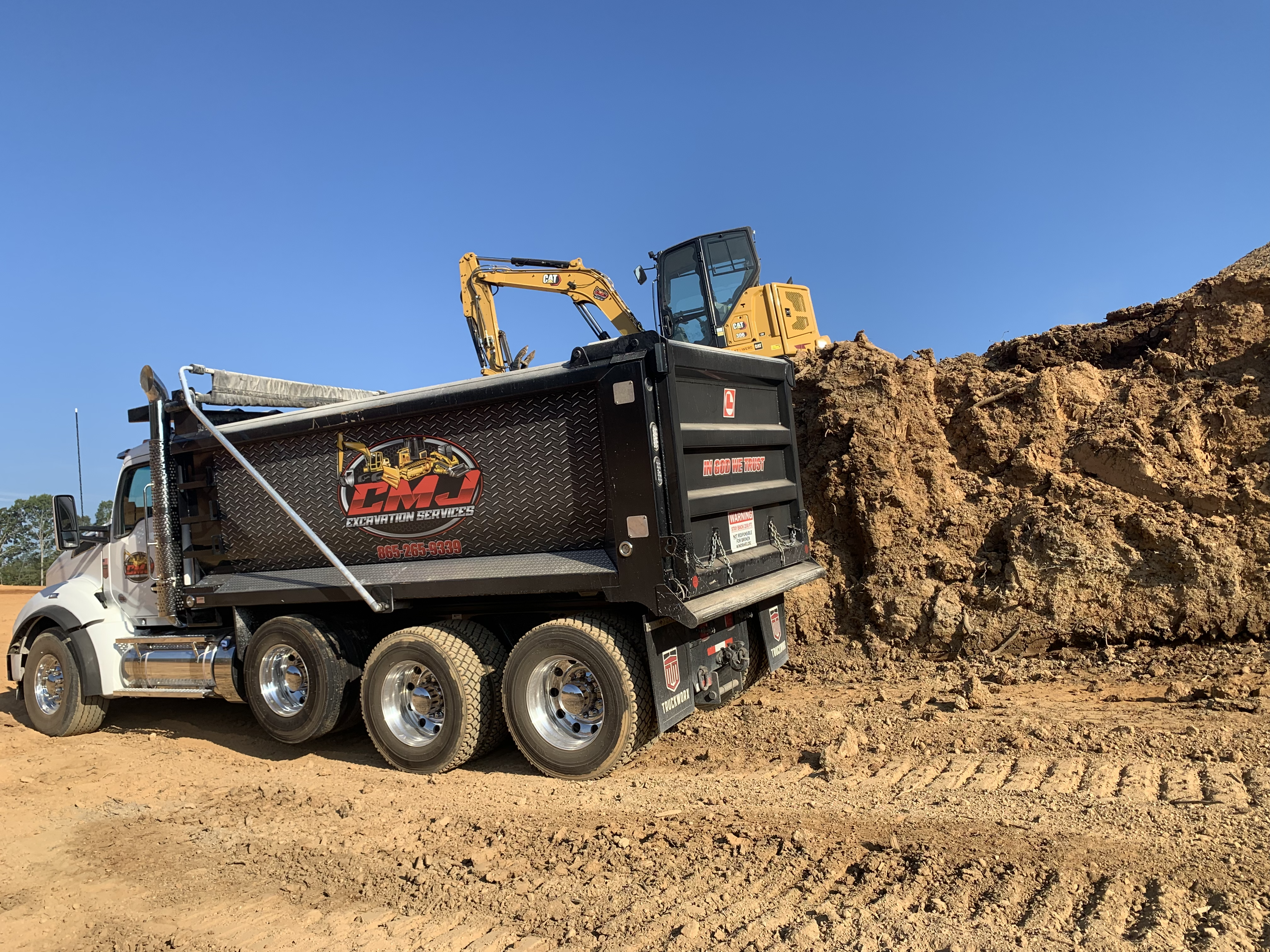 Dump truck hauling and driveway access