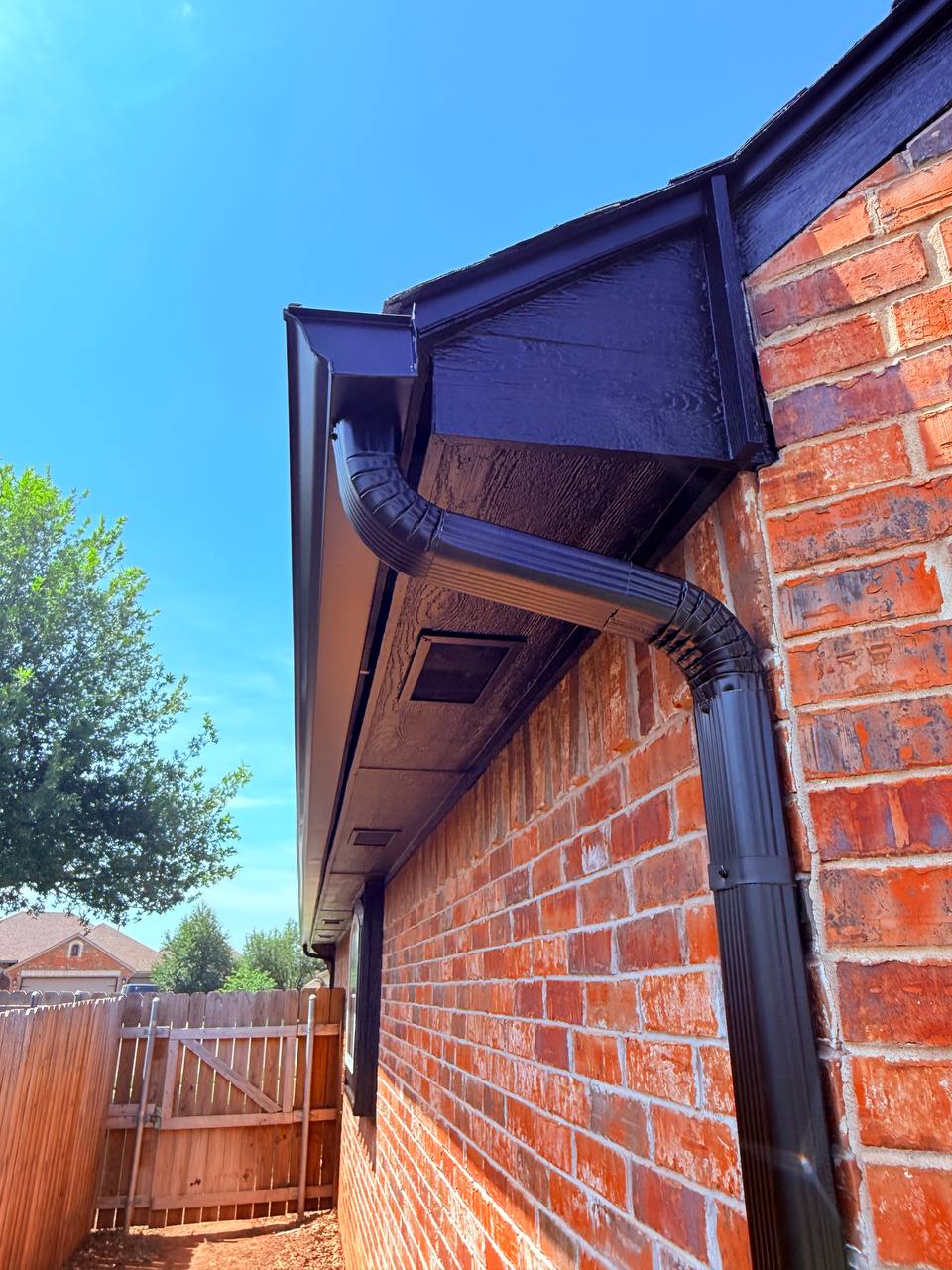 Complete Exterior Restoration in Oklahoma City, OK - Seamless Gutters & Drainage - High Resolution View 1
