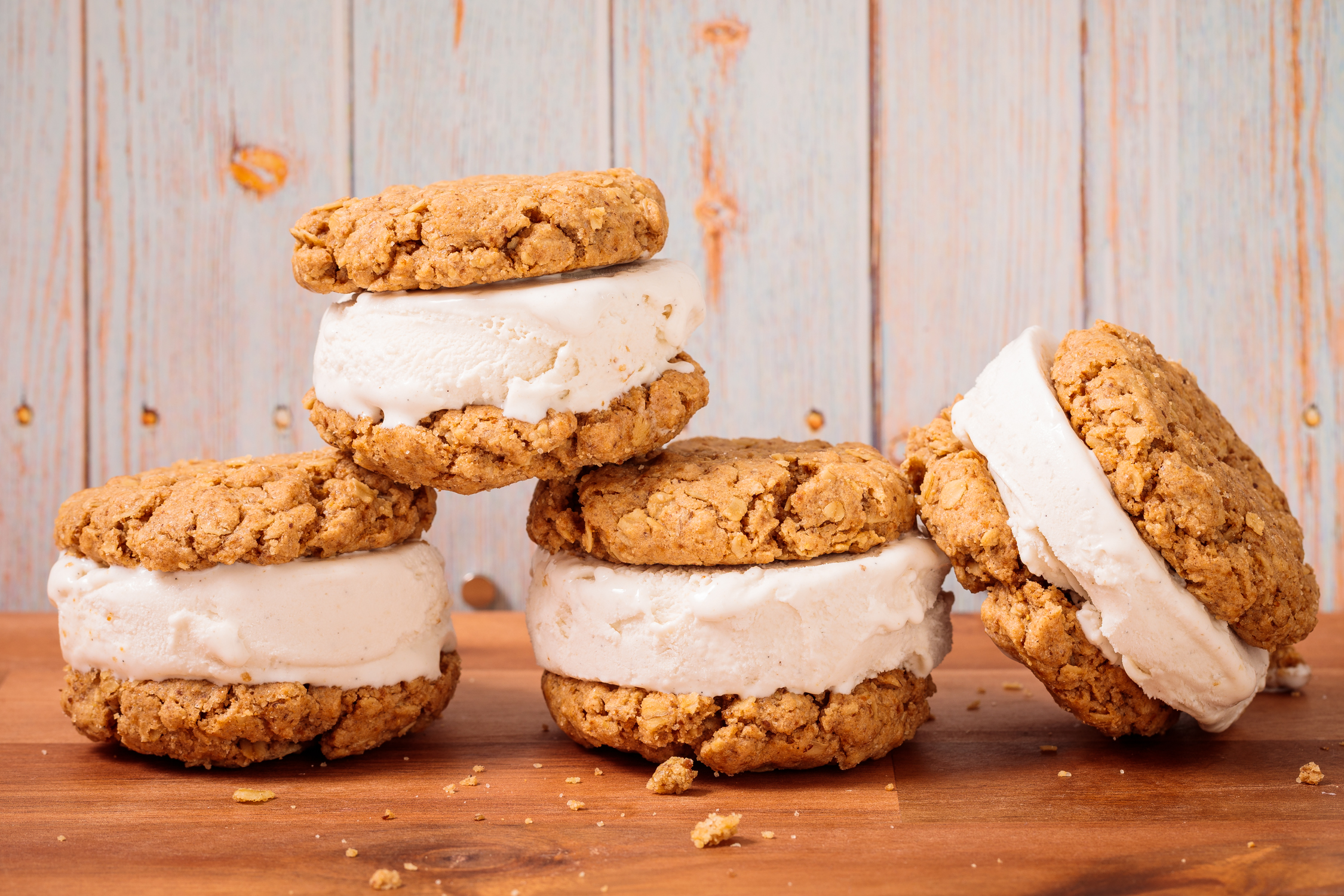 Stacked oatmeal cookie ice cream sandwiches photographed for dessert branding and commercial food photography.