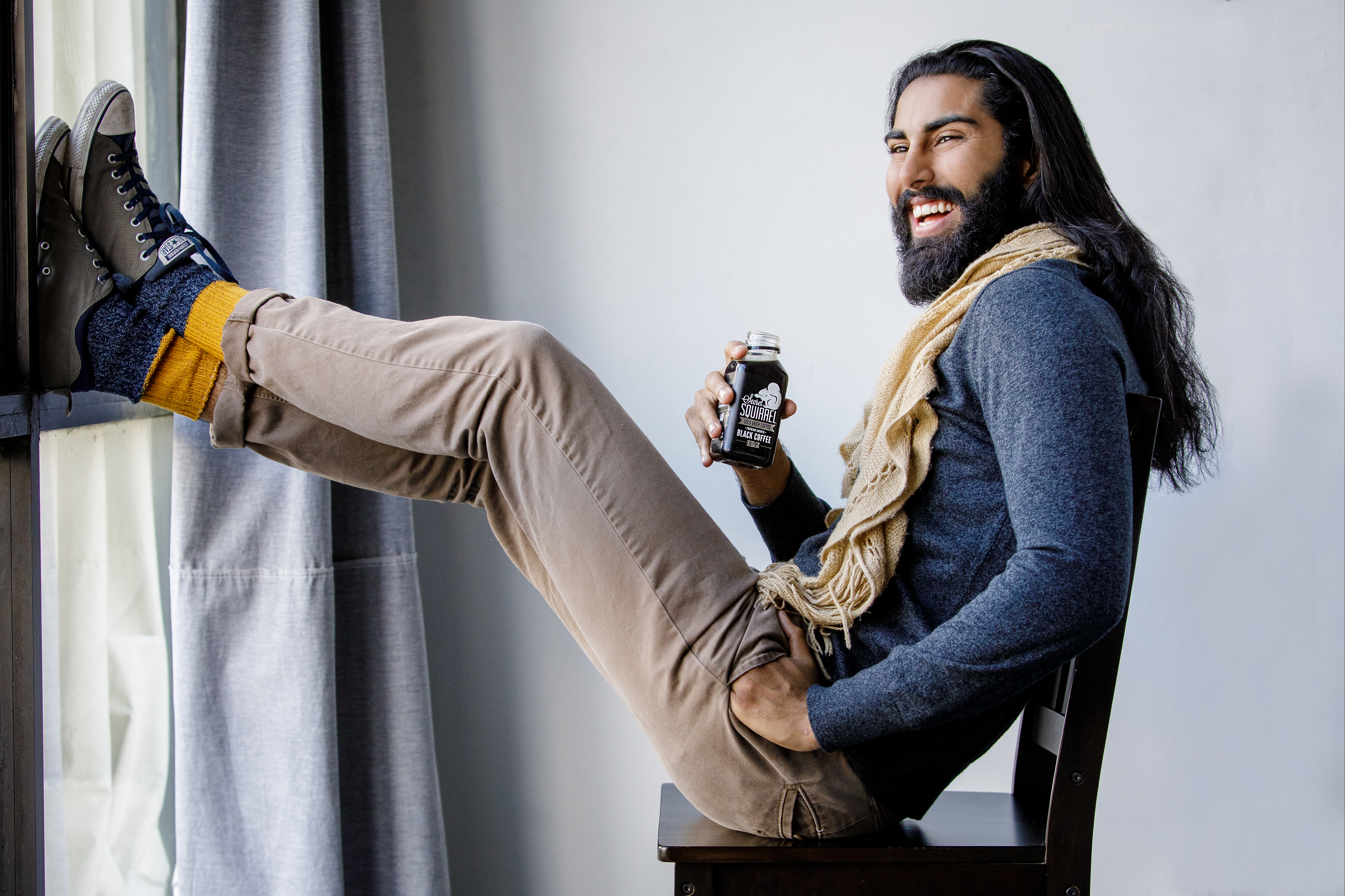 Commercial beverage photography of a lifestyle portrait featuring a bottled drink, created in Los Angeles for beverage brand and marketing use.