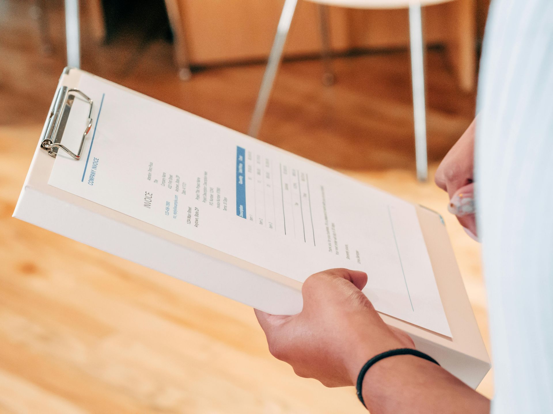 Property manager holding a work order clipboard for a commercial repair in Lubbock, TX