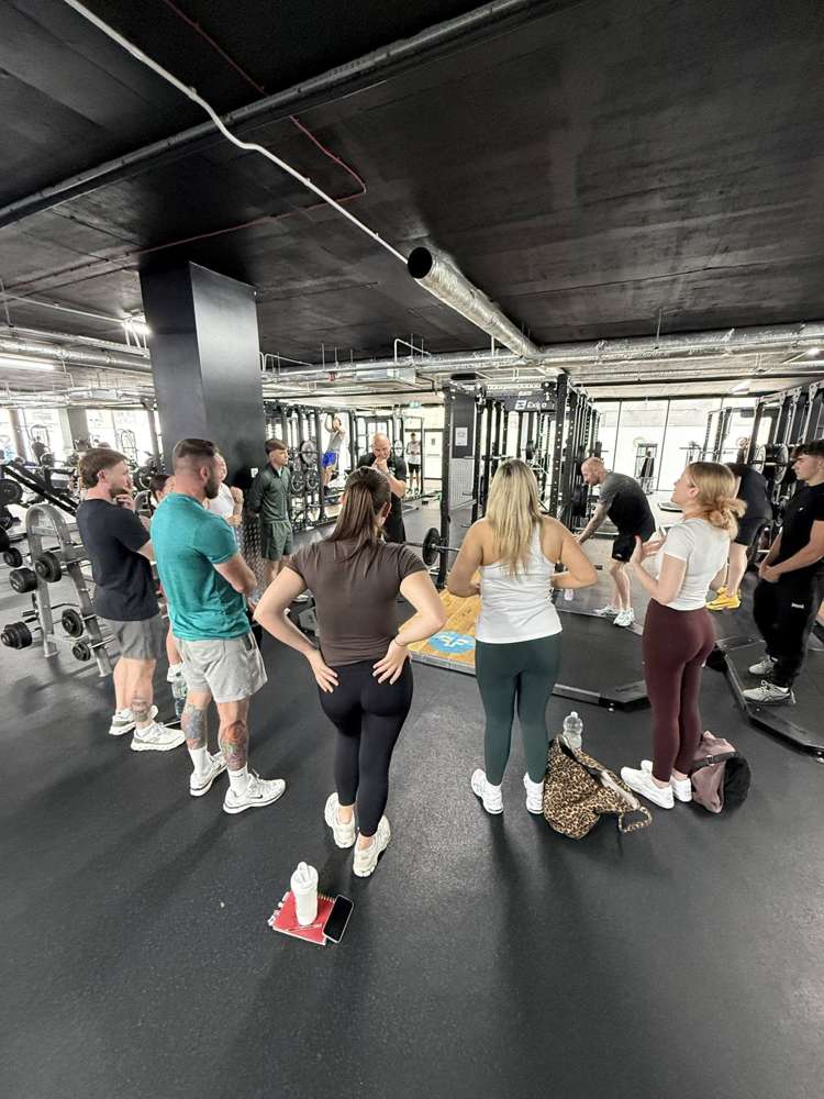 A practical coaching session being delivered to PT Career students on the gym floor