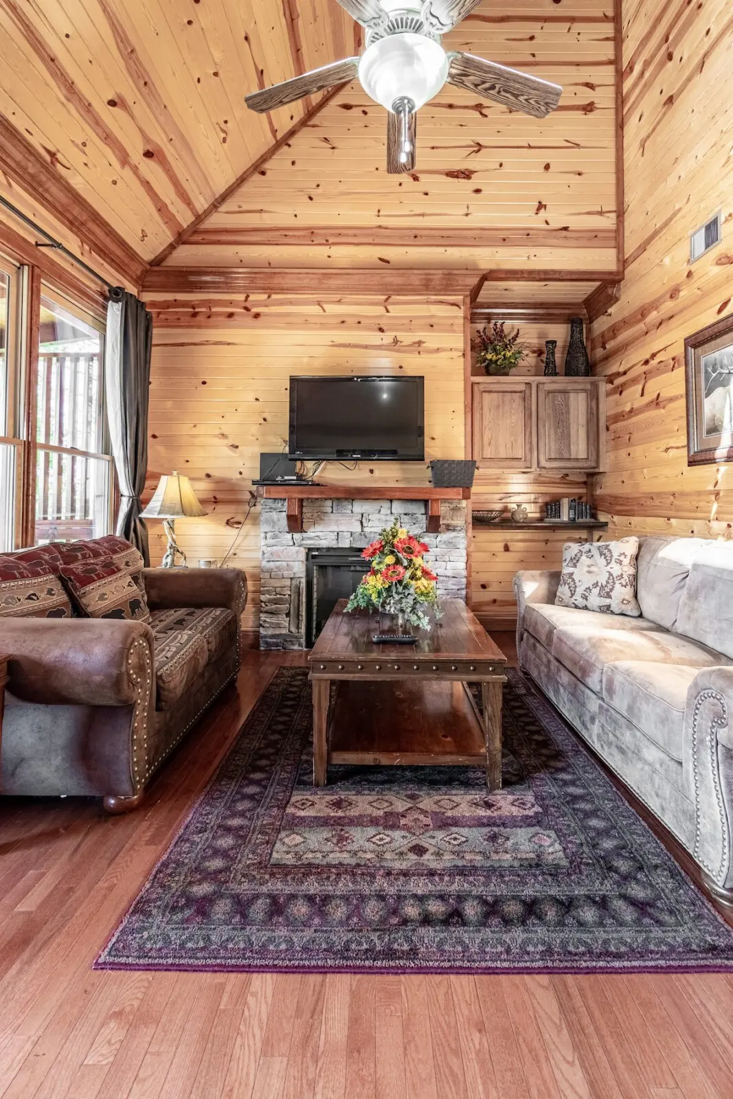 woman setting sheets on bed