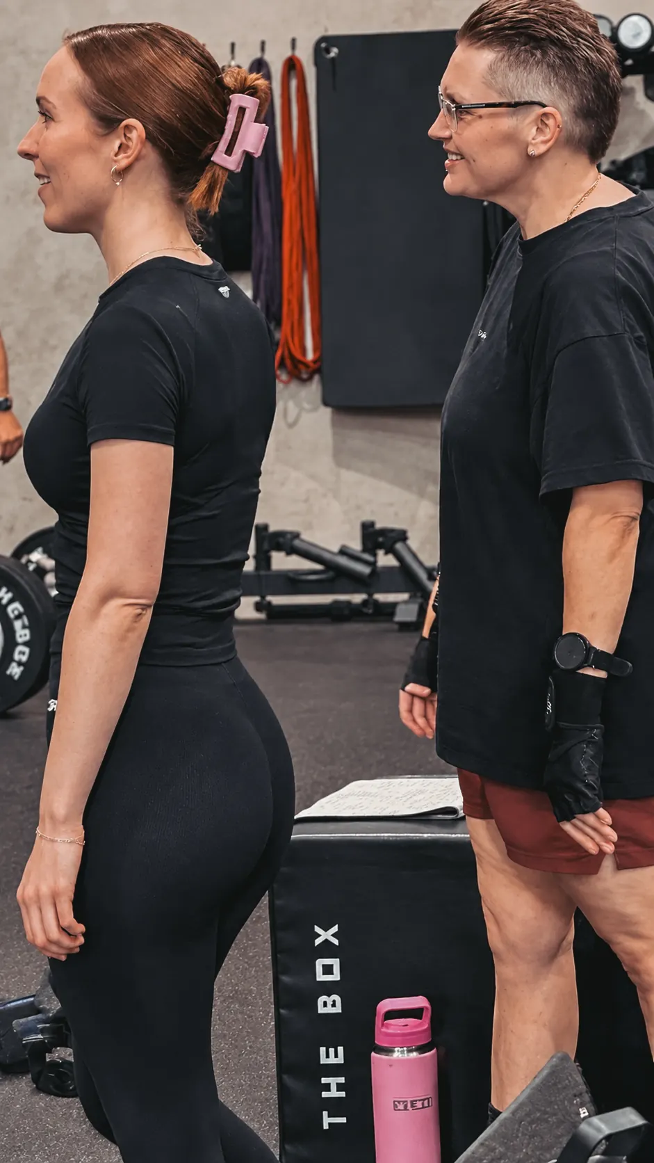 Two members chatting between sets