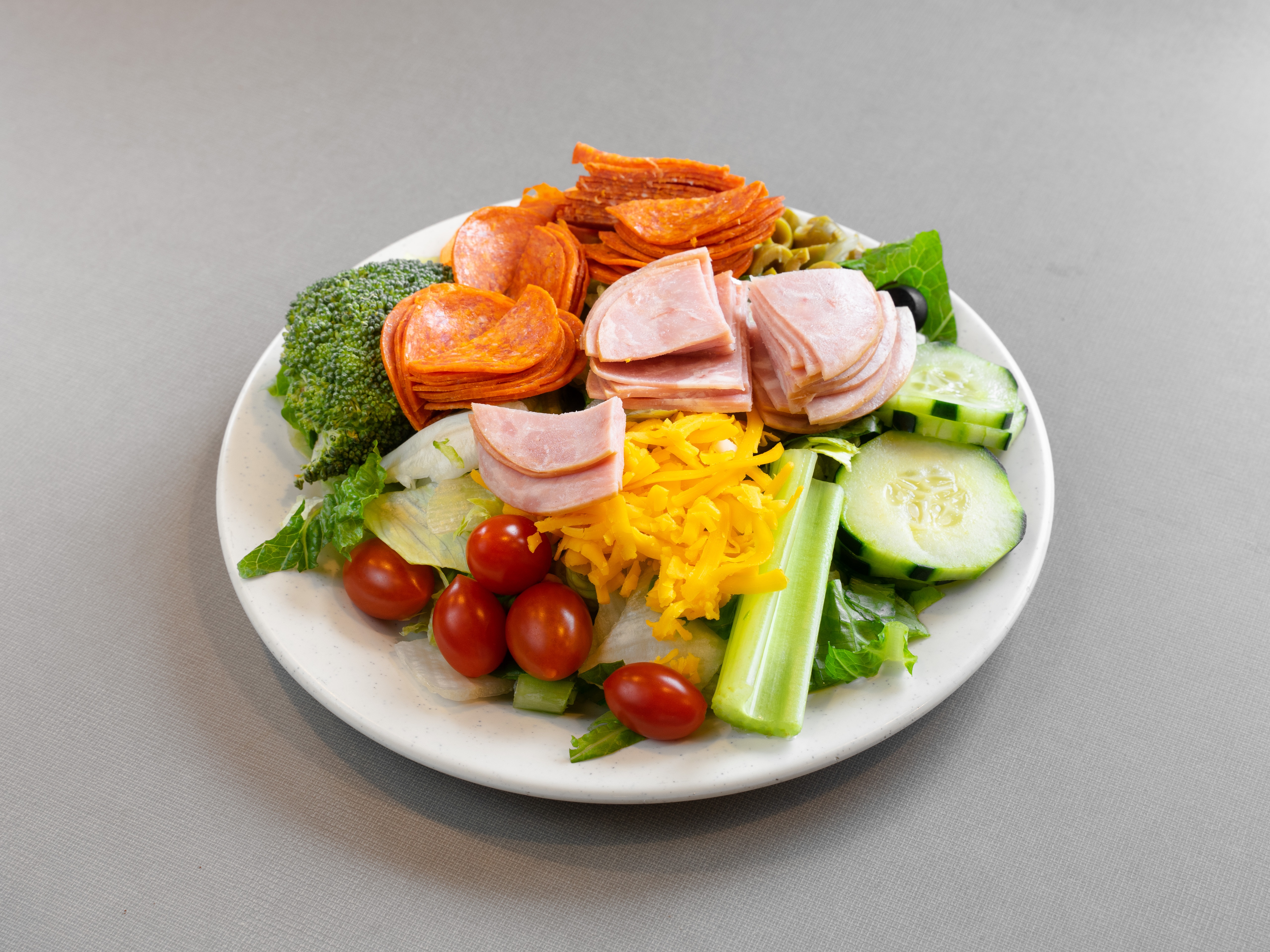 Slice and a chopped side salad