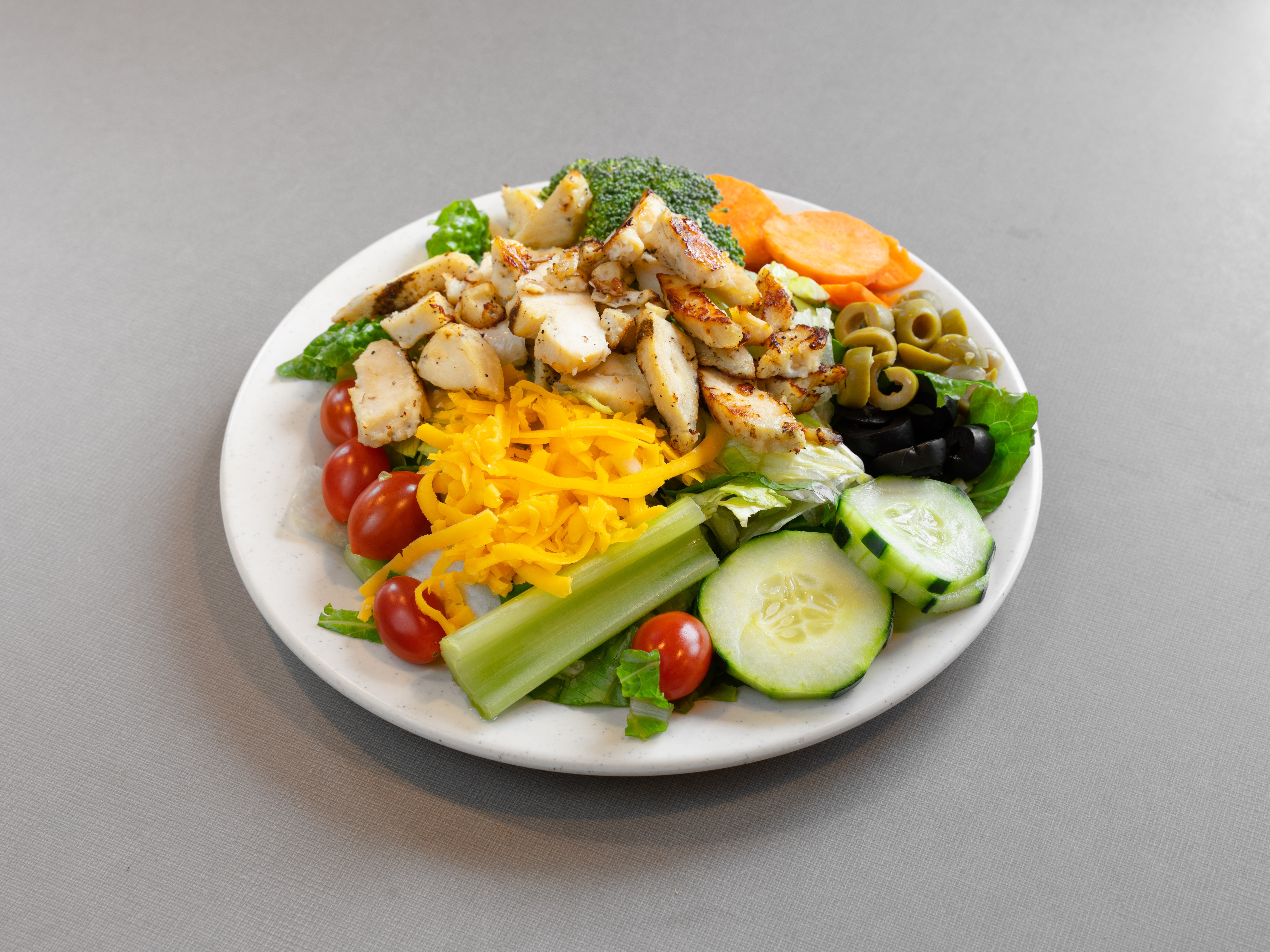 Slice and a chopped side salad