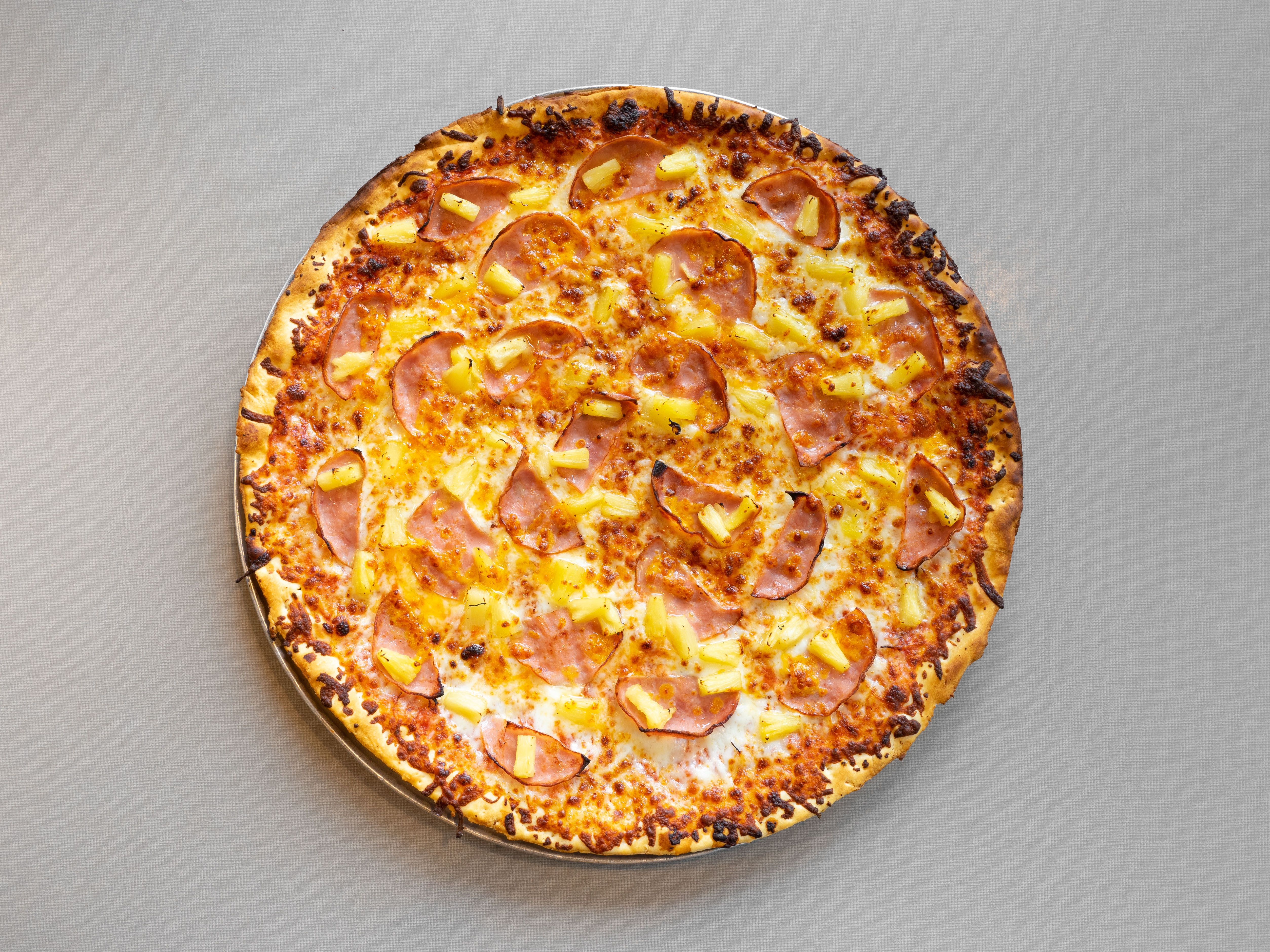 Large pepperoni, whole, straight down