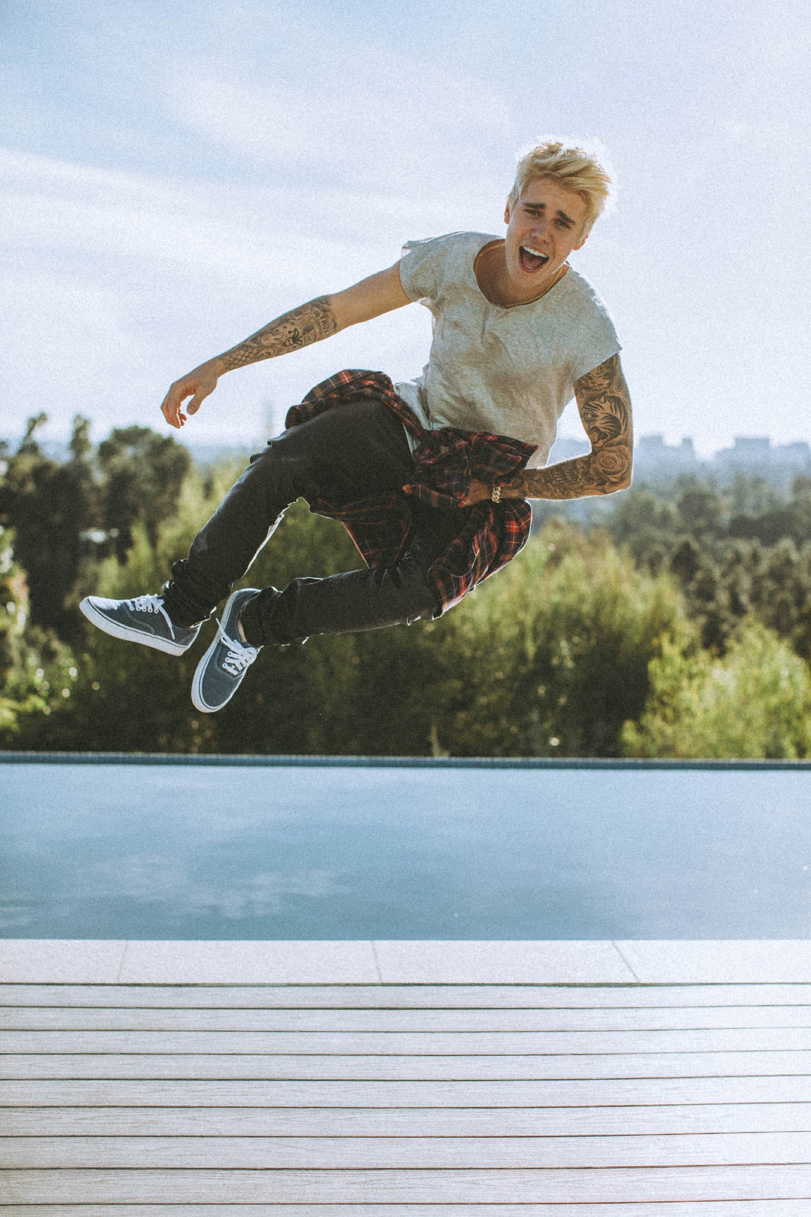 Justin Bieber mid-jump, photographed by Nick Onken