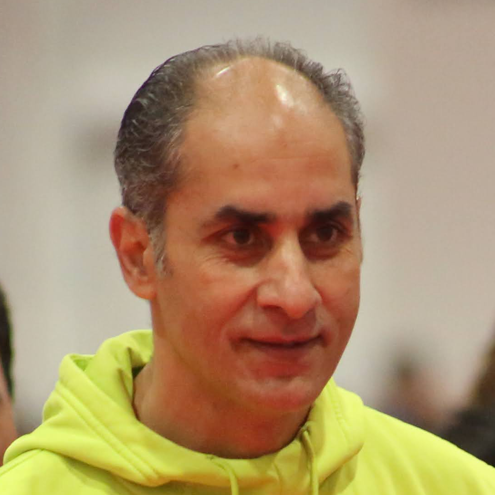 Coach Ahmed “Kimo” Elhefnawy is a former professional and national team volleyball player with over 25 years of experience training and developing athletes. As the Head Trainer of Kimo Champ Volleyball Club, he focuses on helping young players improve their skills, confidence, and game intelligence through structured training, clinics, and high level coaching programs.