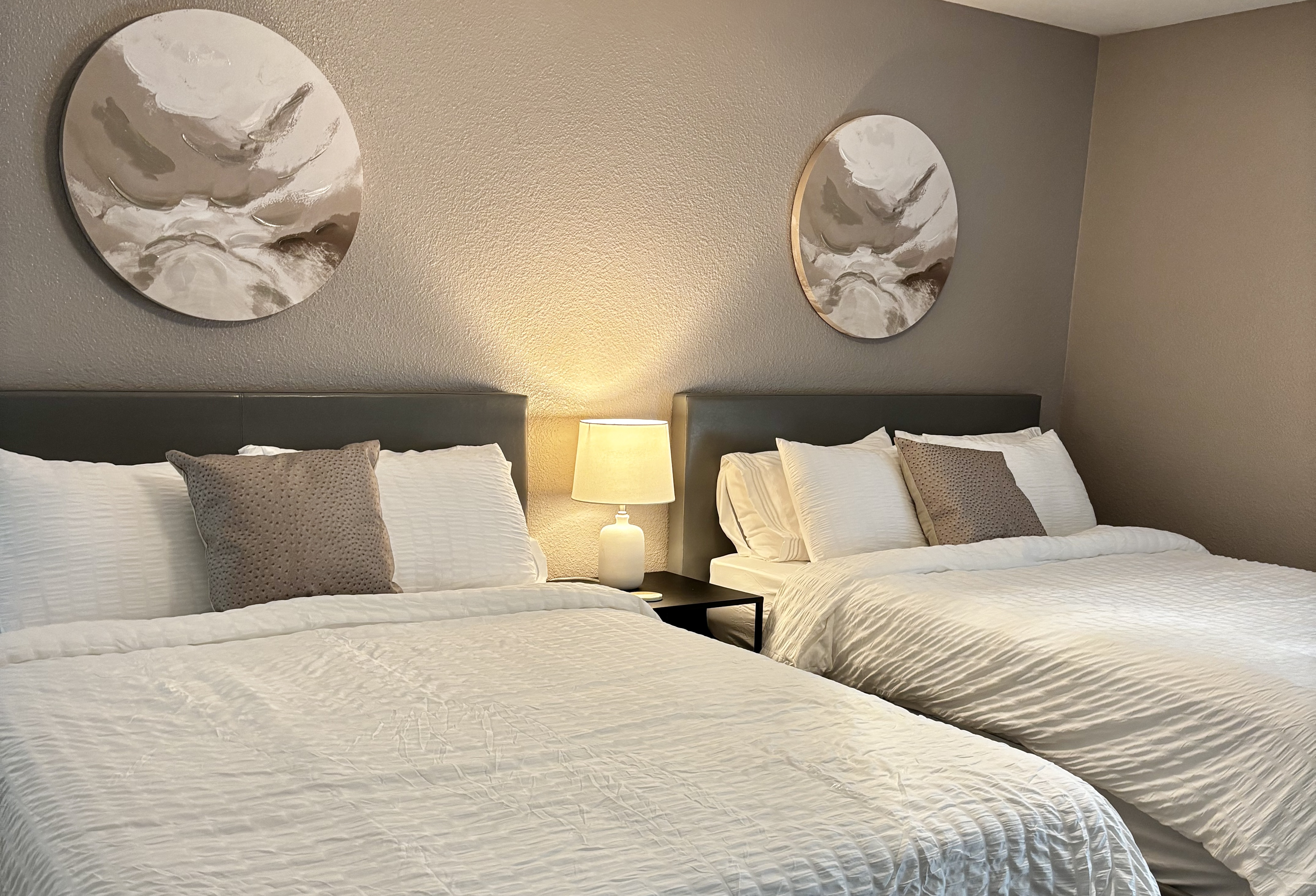 Short-Term Rental Guest Bedroom With Two Queen Beds Short-Term Rental Guest Bedroom With Two Queen Beds