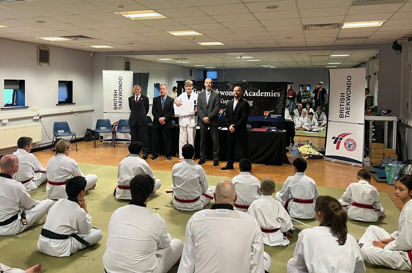 Black belt certificate presentation at the British Taekwondo Dan grading Black belt certificate presentation at the British Taekwondo Dan grading