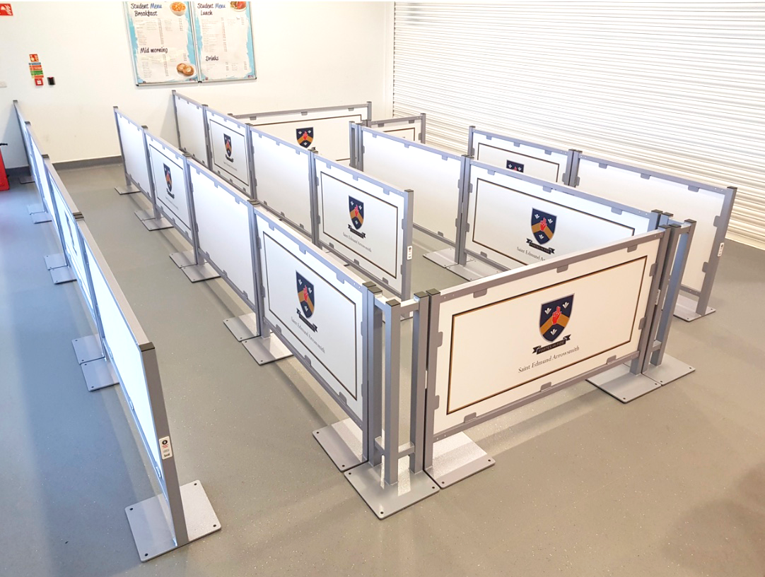 Custom printed queuing barrier panels with school branding