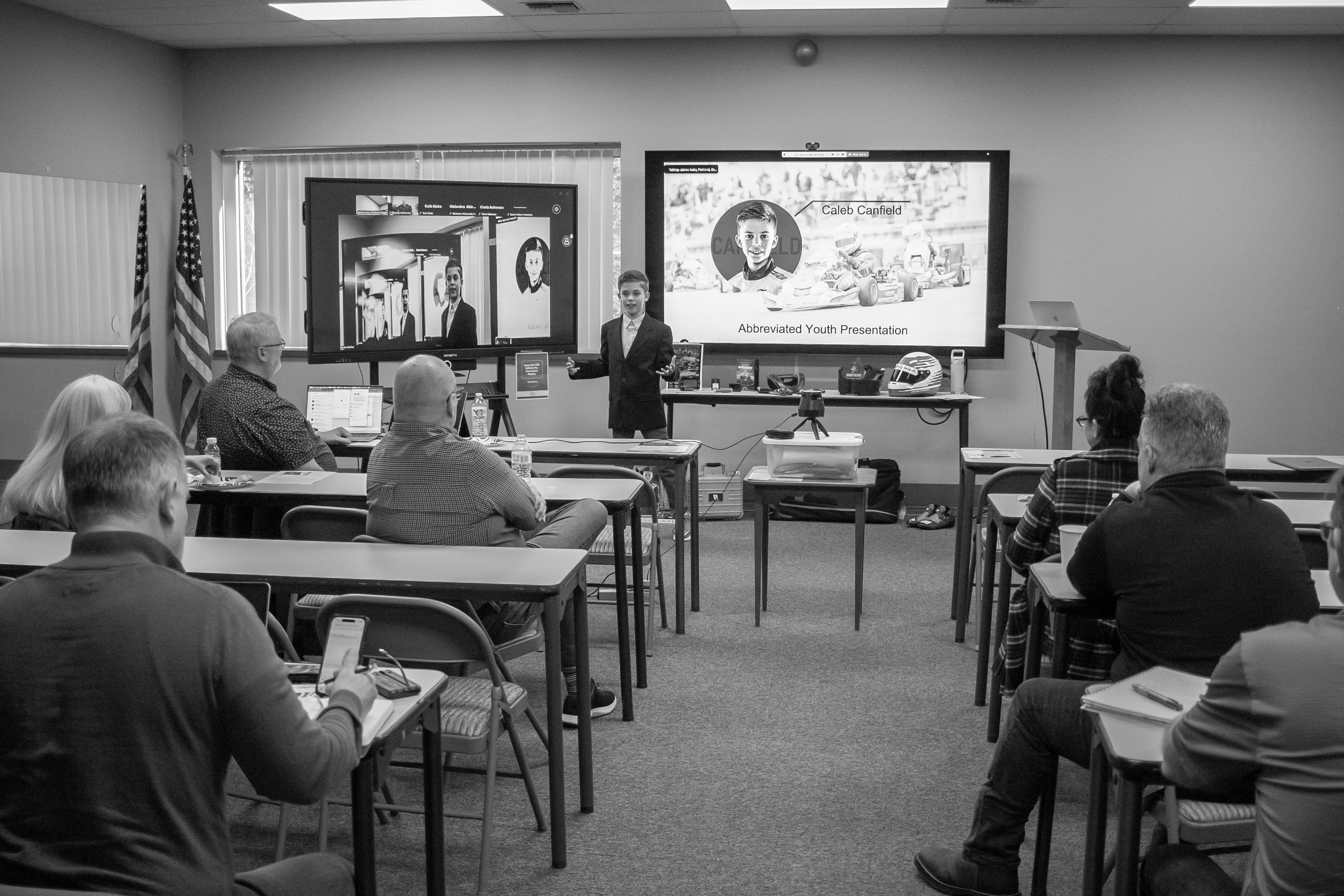 Caleb presenting at a corporate event