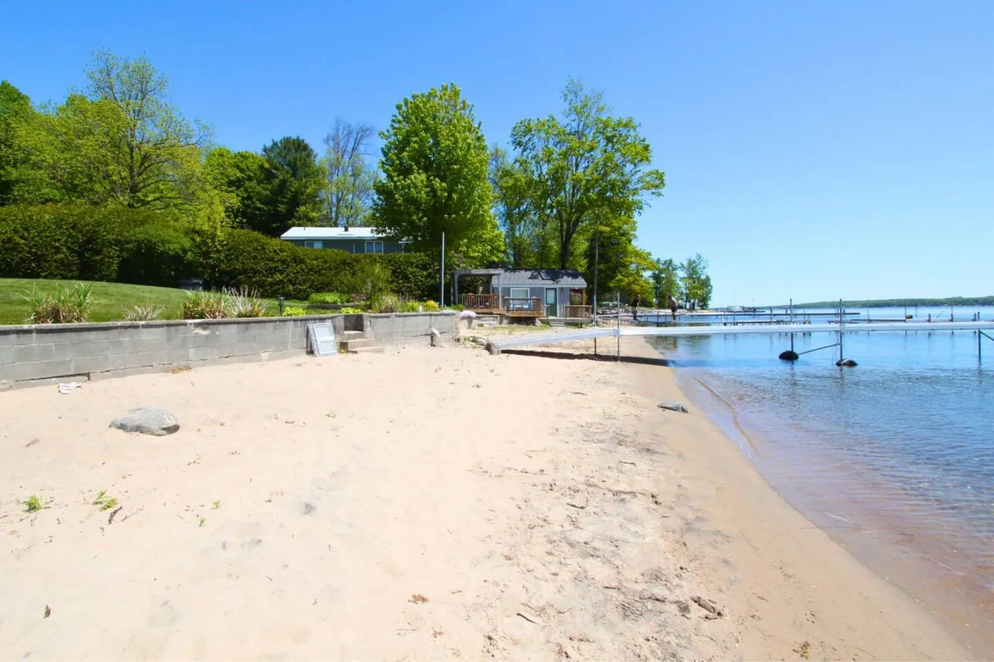 Wide, shallow sand beach along the Georgian Bay shore at Bayside