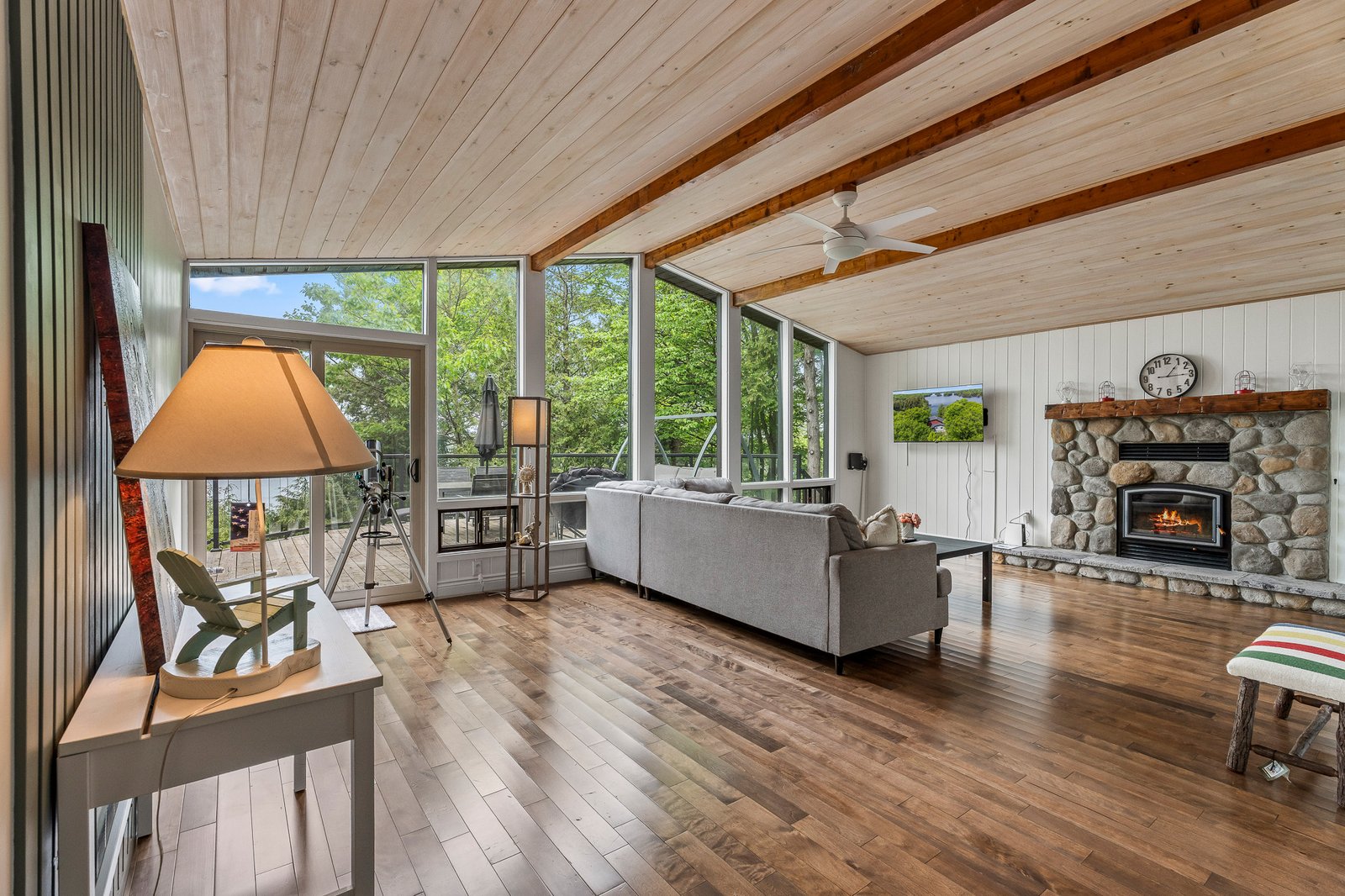 Vaulted great room with stone fireplace