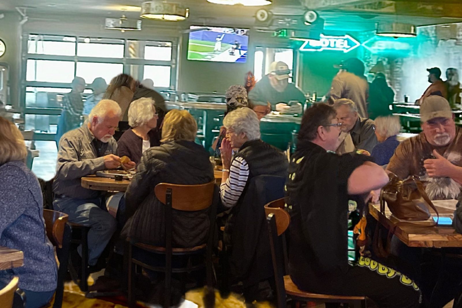 Guests enjoying dinner at The Rusted Nut
