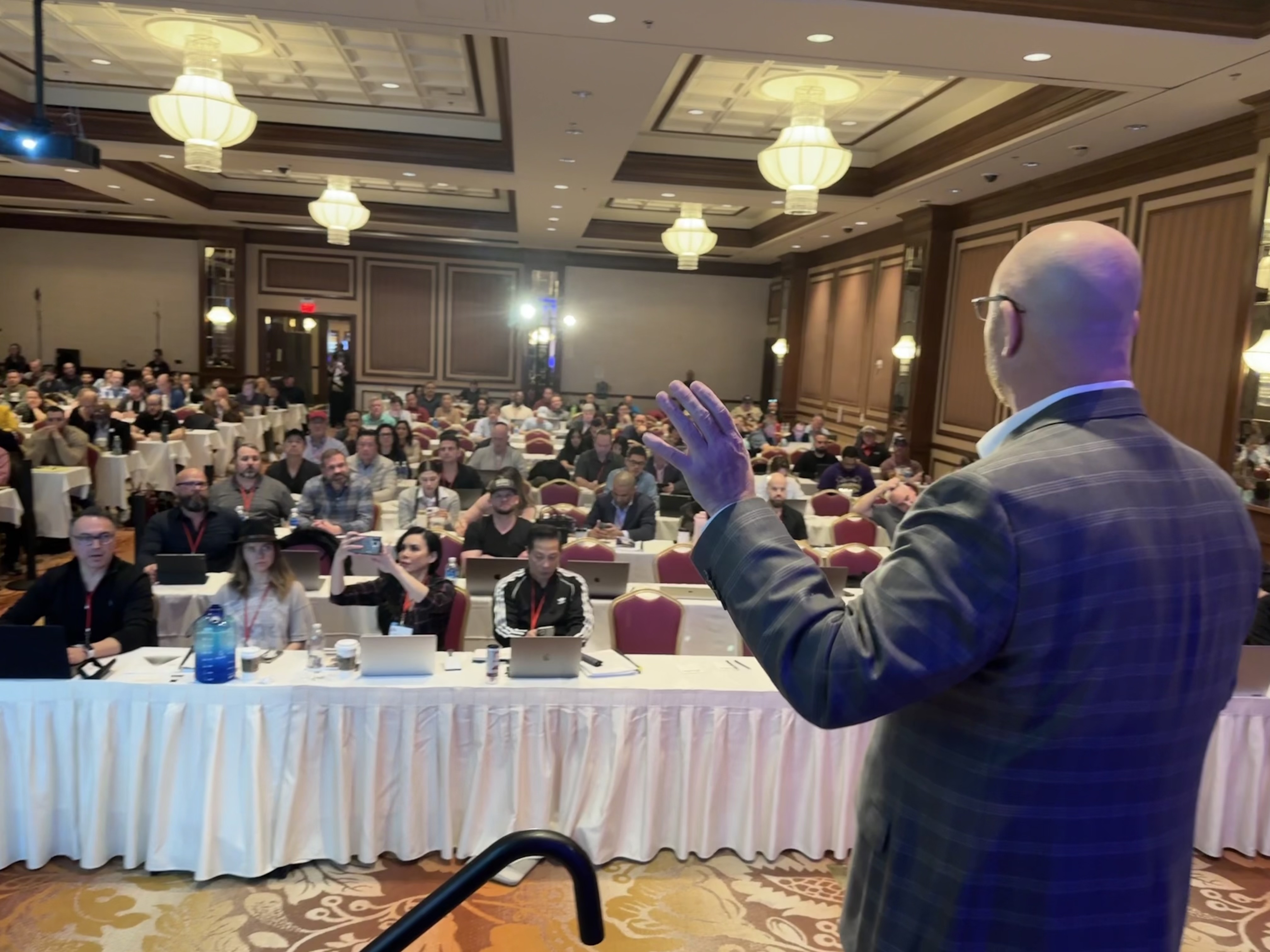 Terrance McMahon addressing a room of advisors at an AI-Powered Advisor Summit