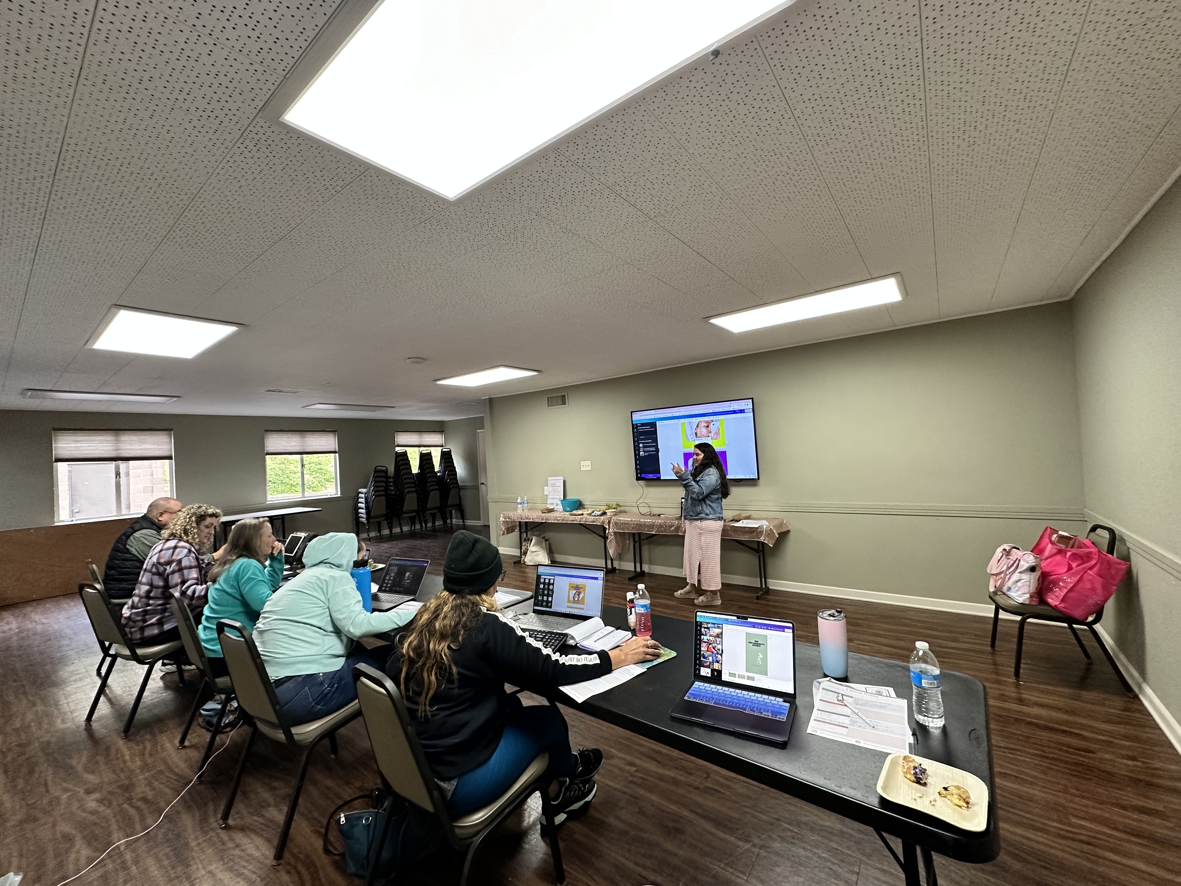 Meghan leading a live business workshop