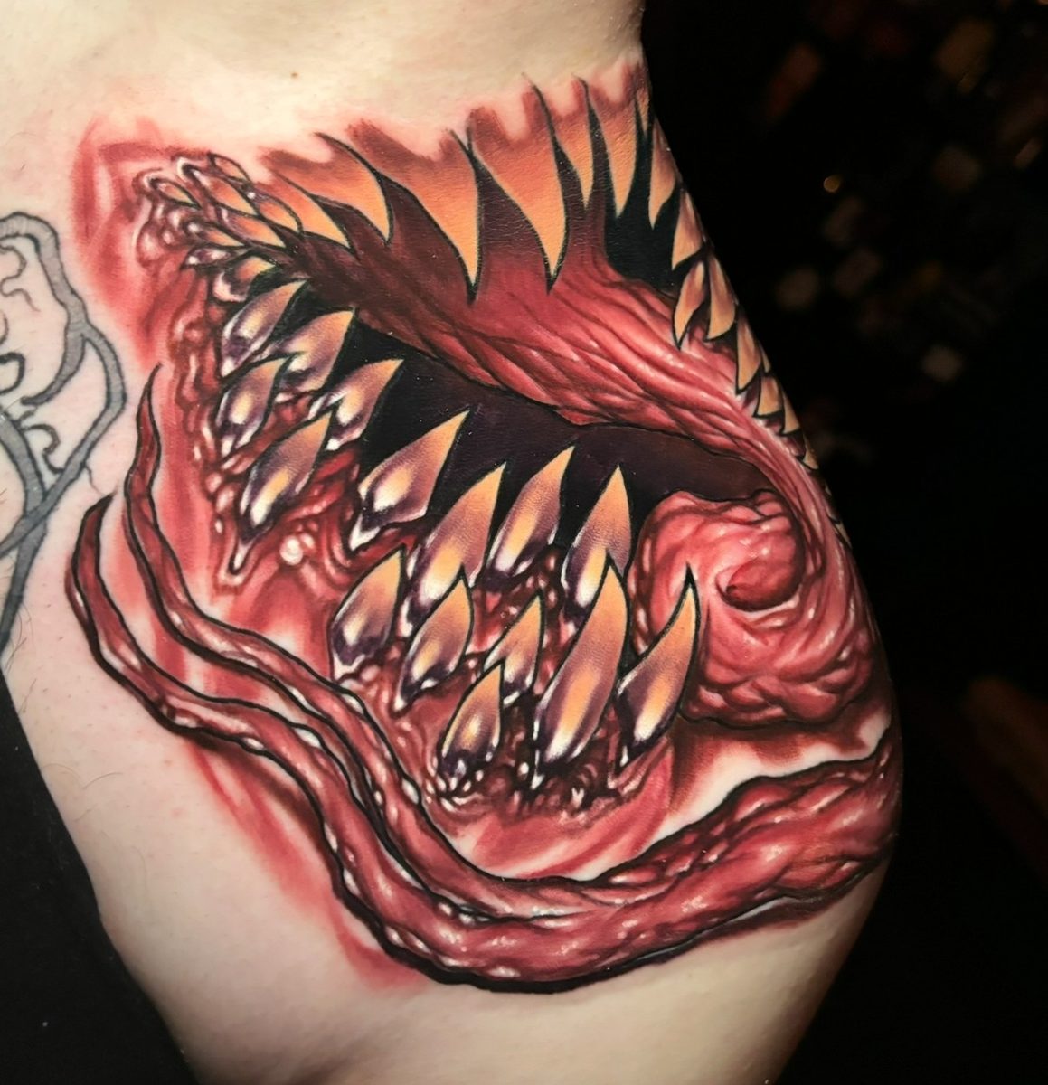 Red toothed maw tattoo