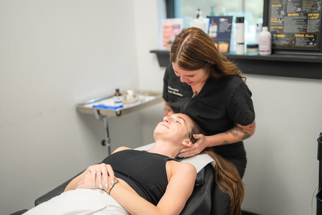 Provider performing microneedling treatment
