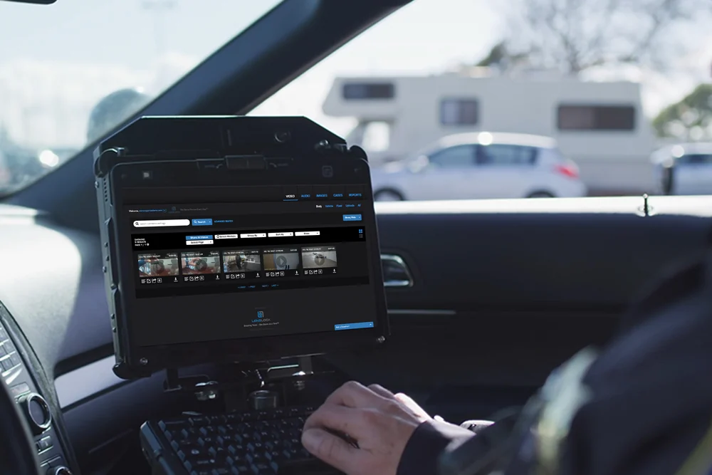 Officer browsing the video library on an in-car screen