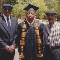 Bryan at his Texas A&M graduation with his uncles