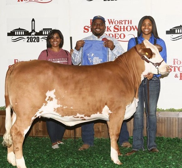 Bryan, Nicole and Breyana with Breyana's heifer at the 2020 Fort Worth Stock Show