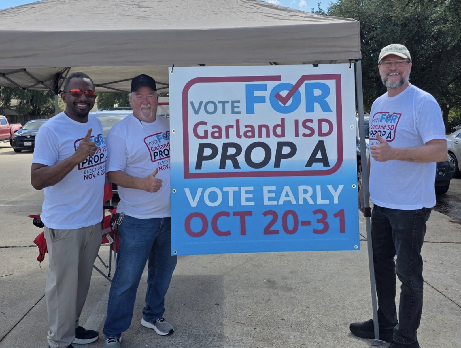 Bryan with Prop A volunteers at an early voting tent