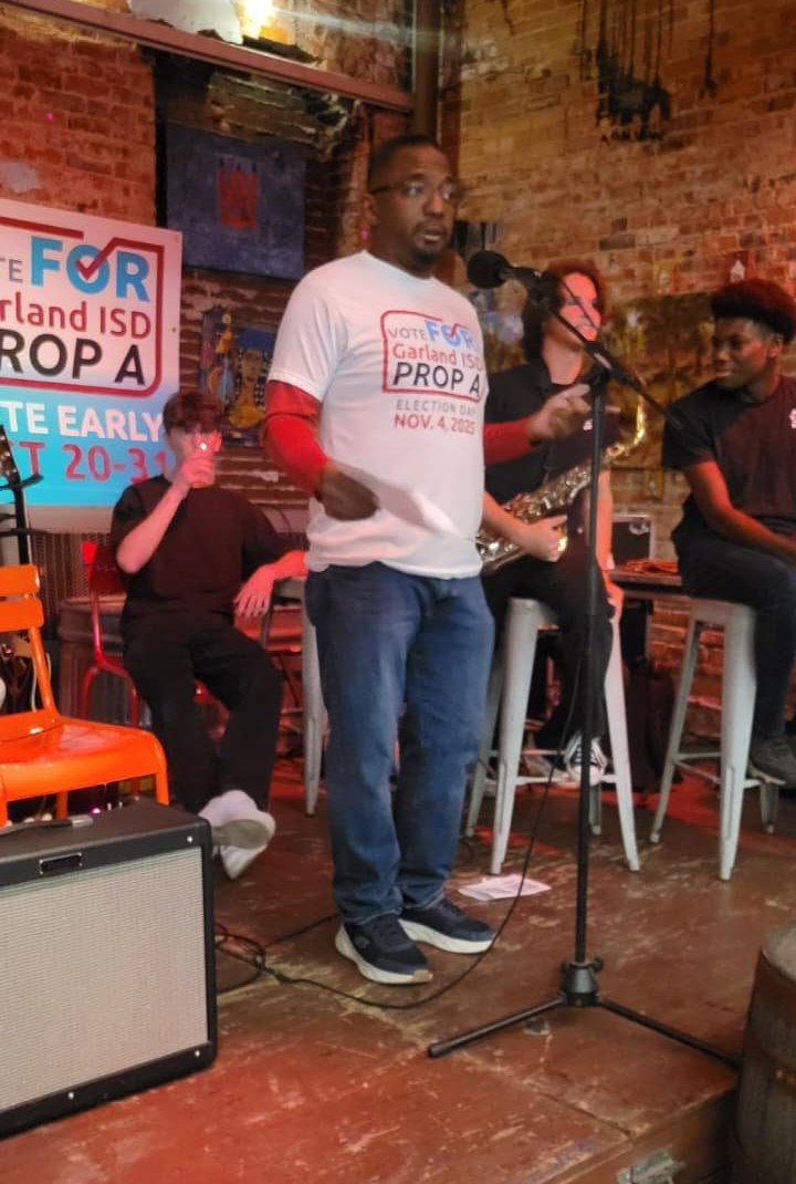 Bryan speaking at a Prop A community event