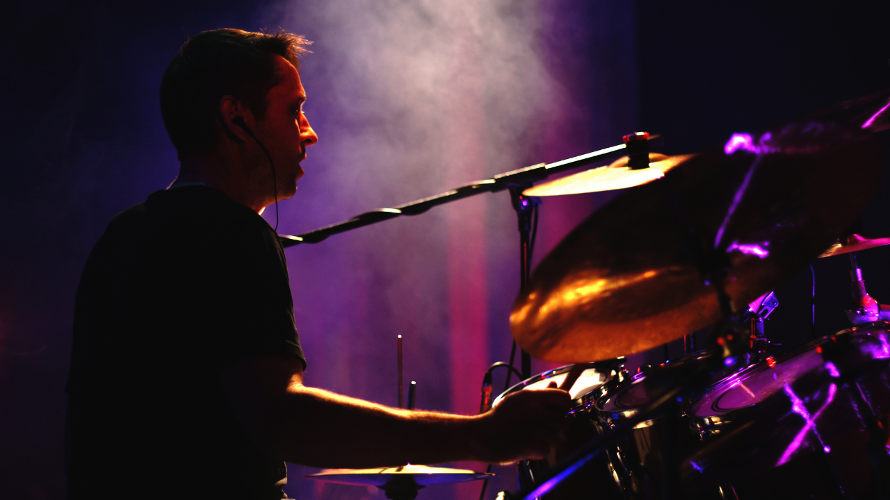 Drummer performing live