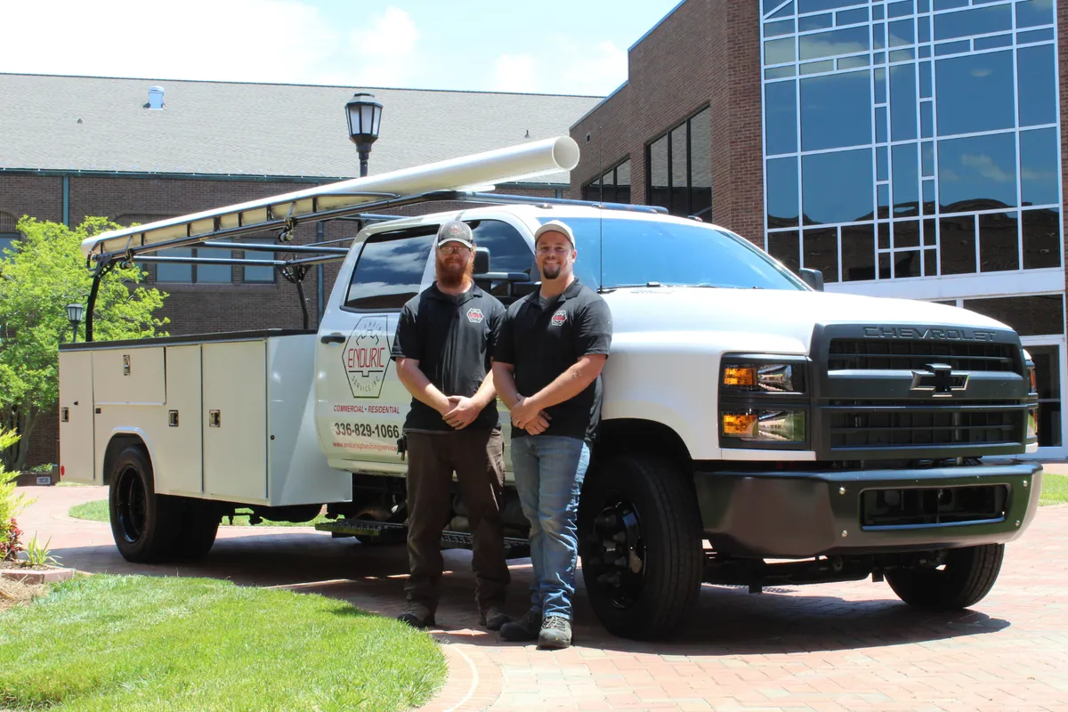 Enduric Plumbing Services team and service truck