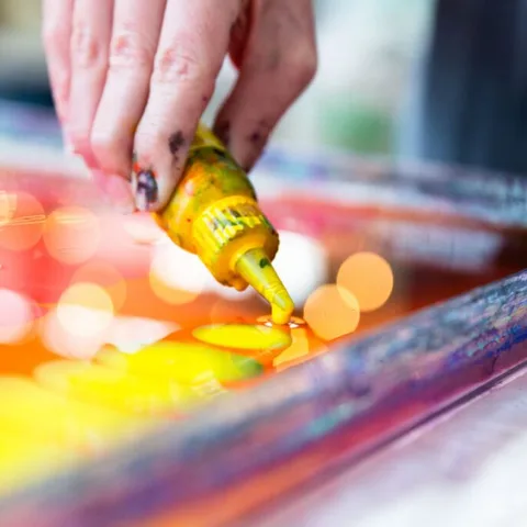 Photo: Sawtooth School for Visual Art website A student working with bright paint in a Sawtooth class (Photo: Sawtooth School for Visual Art website)