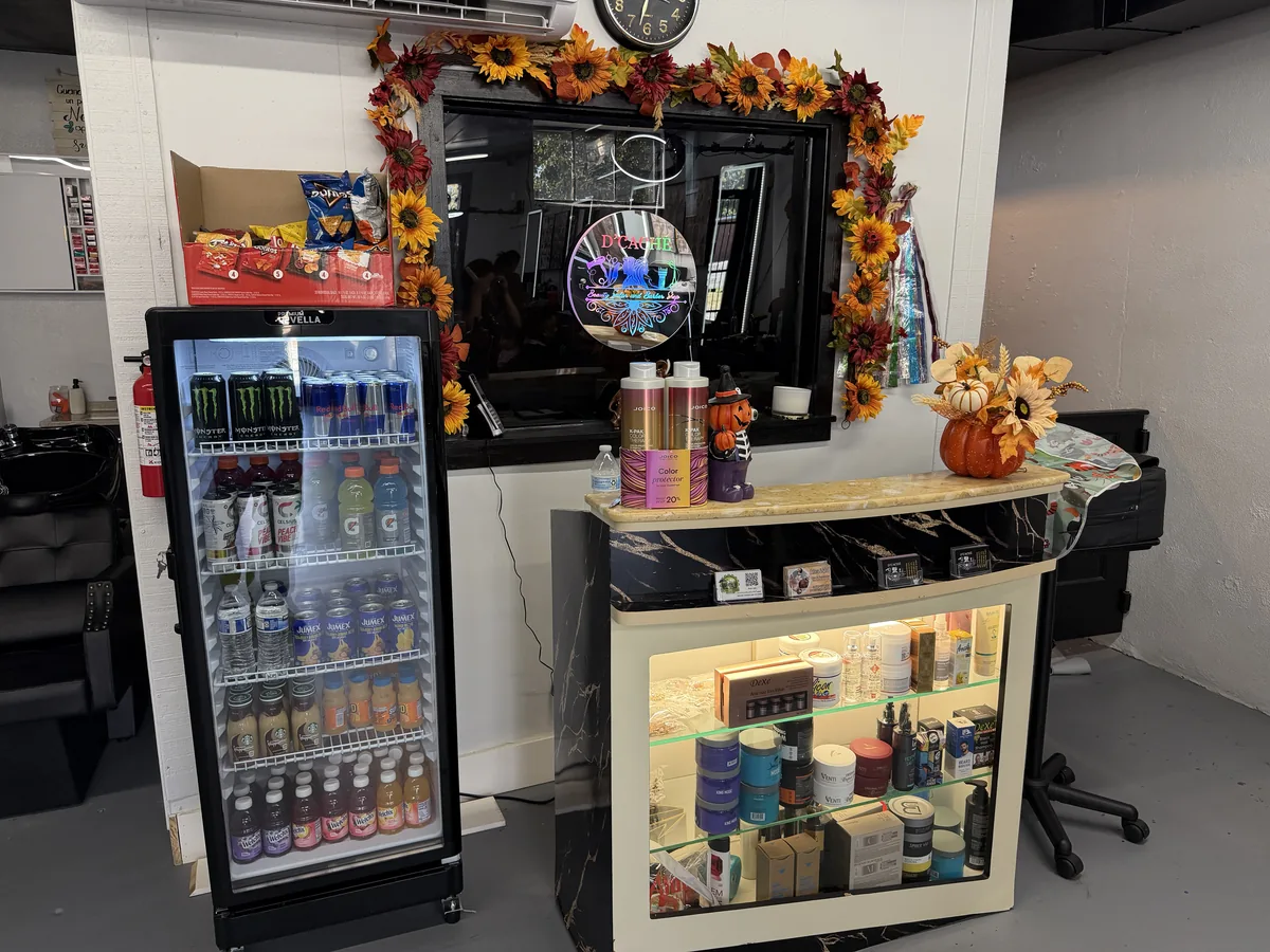 Hair products and a cold drink cooler at Dcache